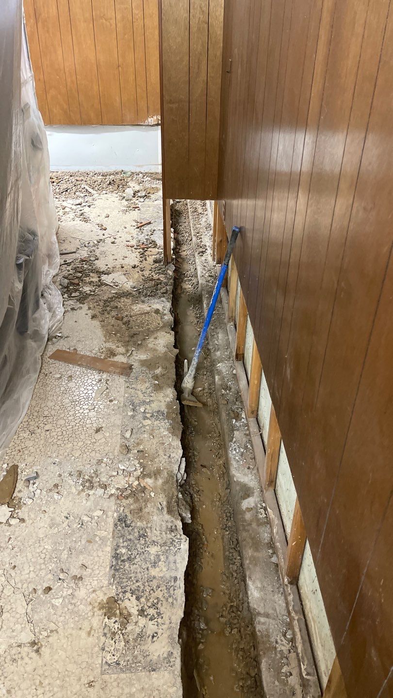 Interior Waterproofing Using GrateDrain™ Products by Toledo Basement Repair