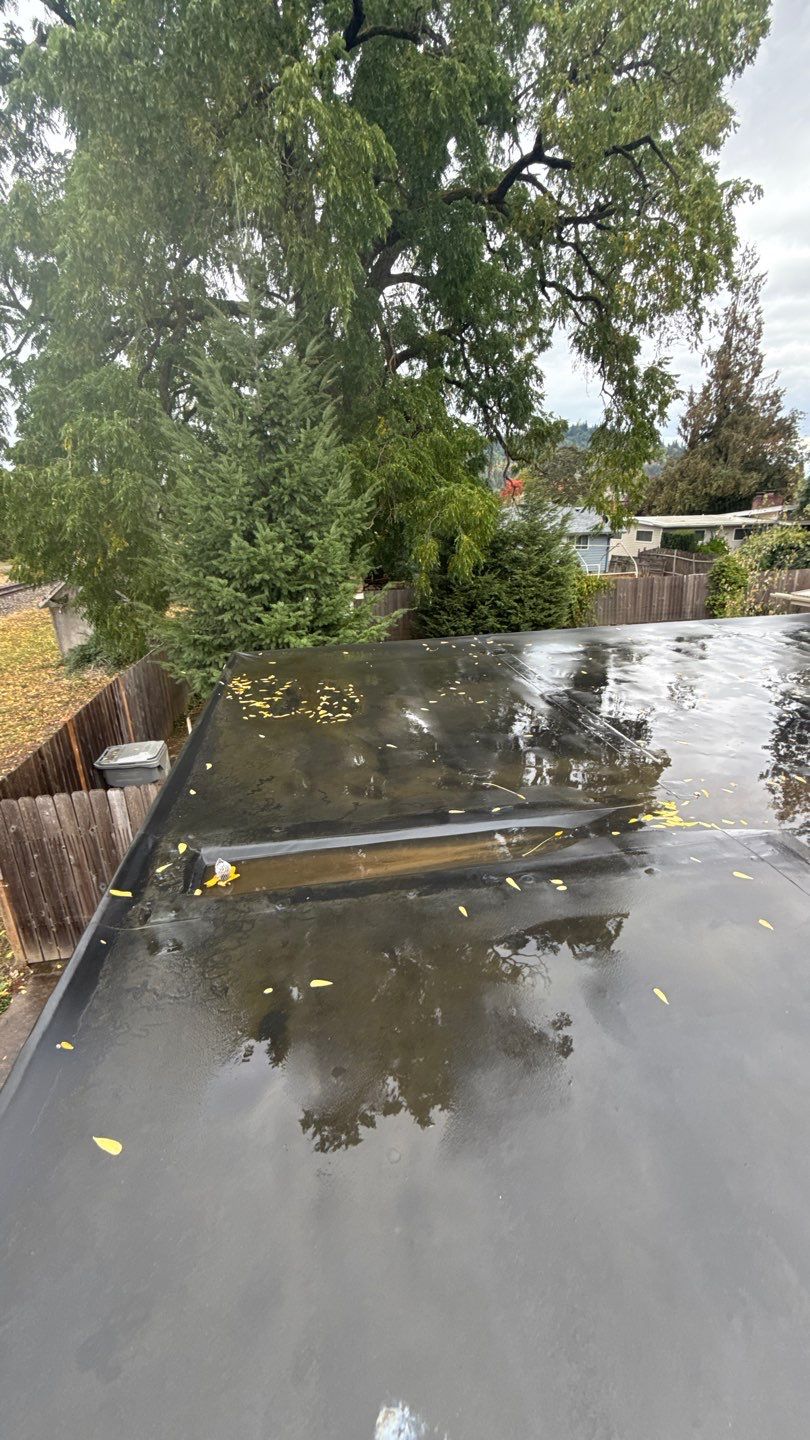 Residential Membrane Roof Replacement by Orezona Building & Roofing Company, Inc.