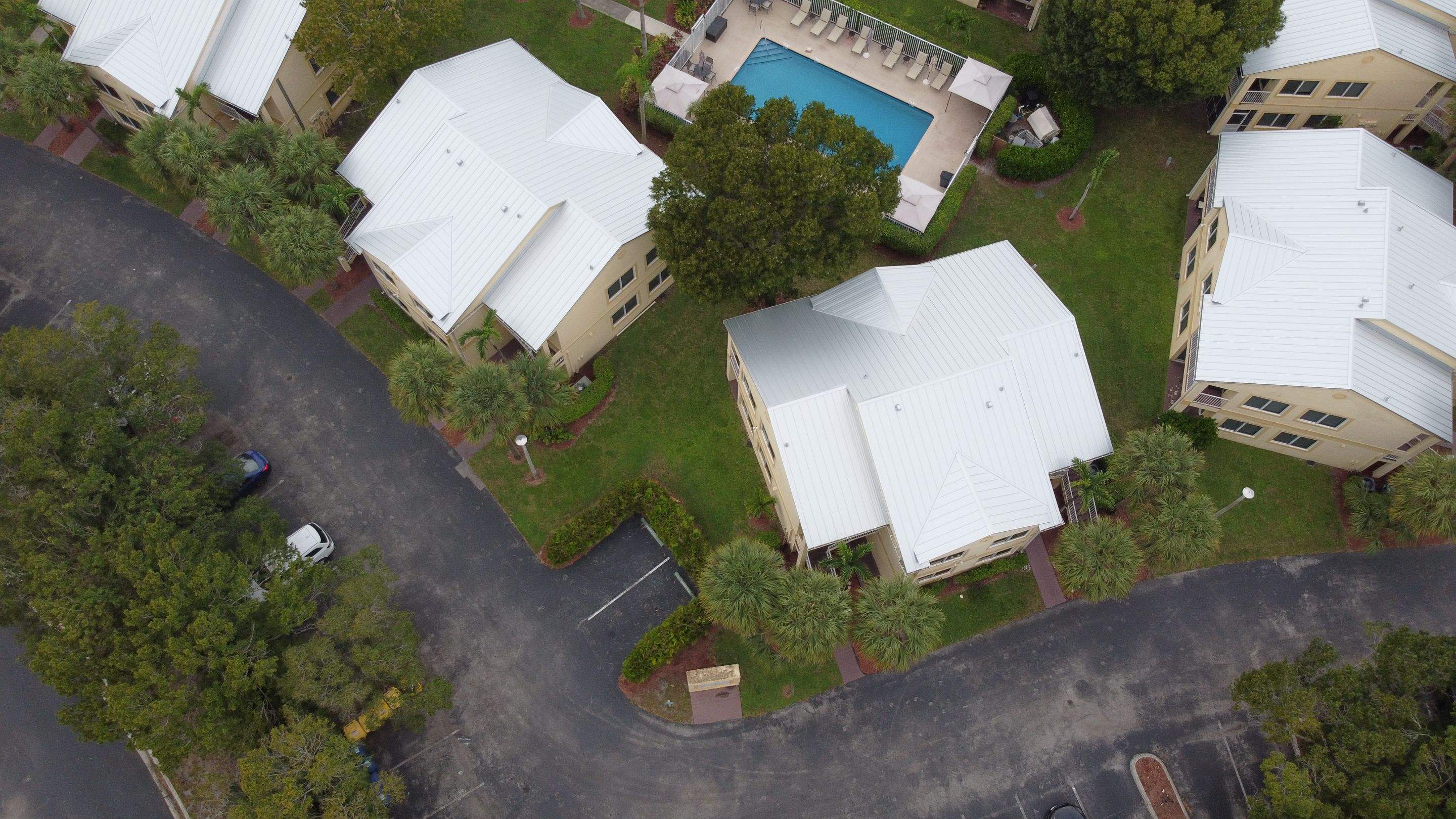 Commercial Roofing Installation using 1" Nail strip metal roof by BLUES BROTHERS ROOFING