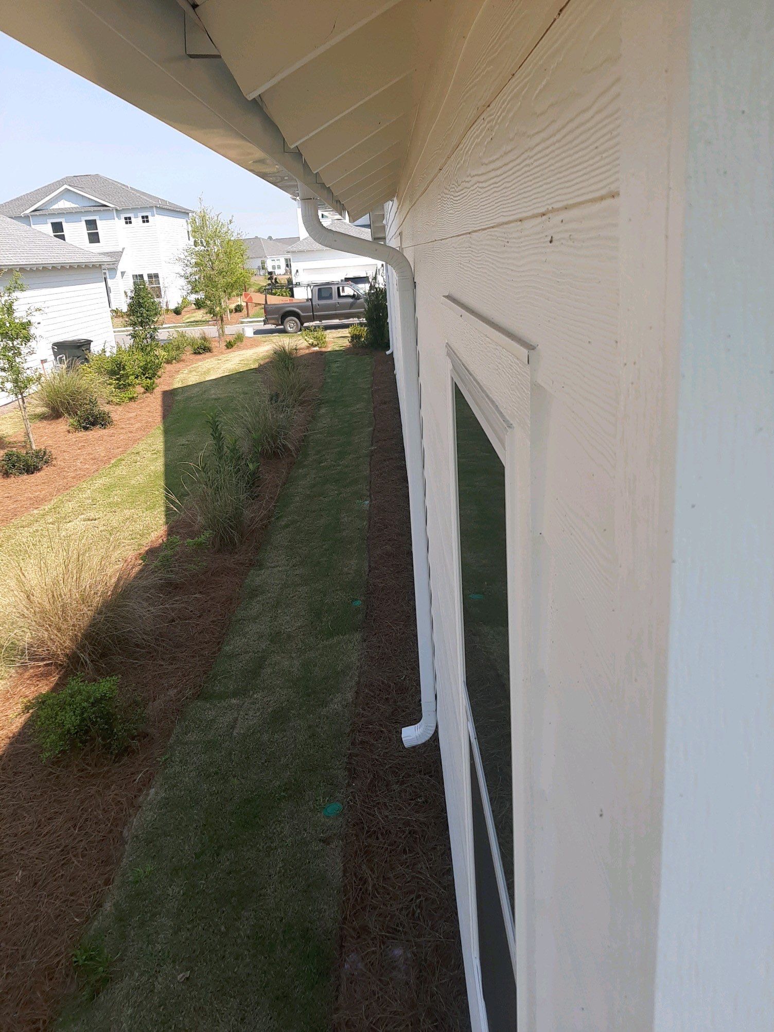 Gutter Installation Using White K-Style Aluminum Seamless Gutters by Gutter Professors