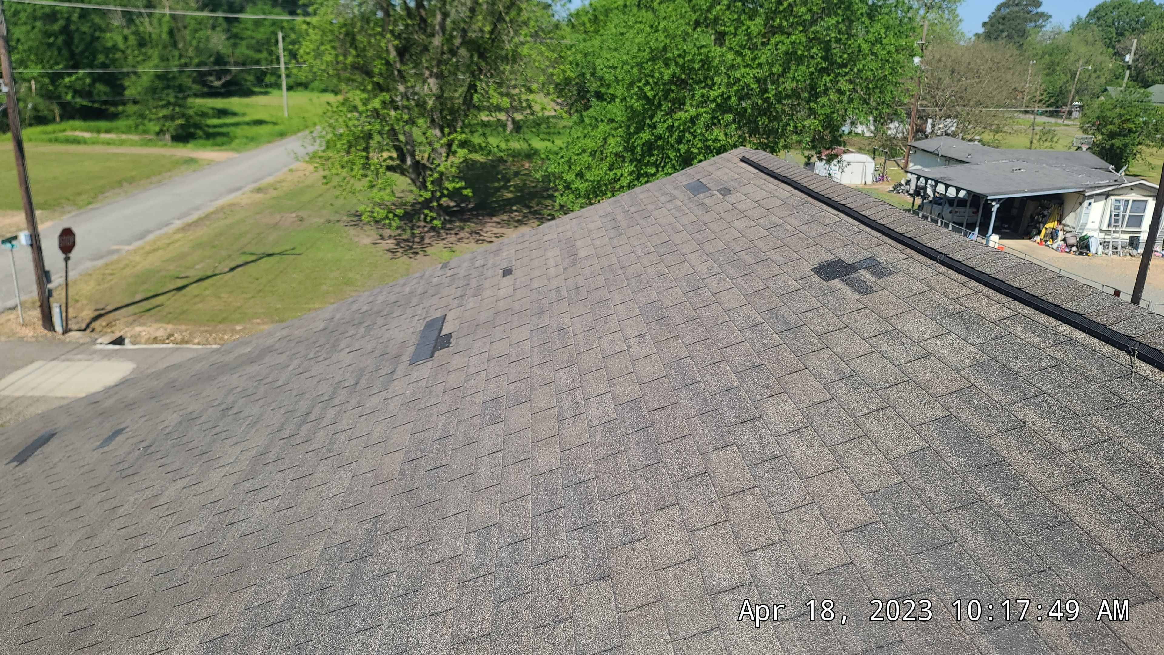 Storm Restoration Reroof: 25 Year 3-Tab Shingle by Hostetler Roofing