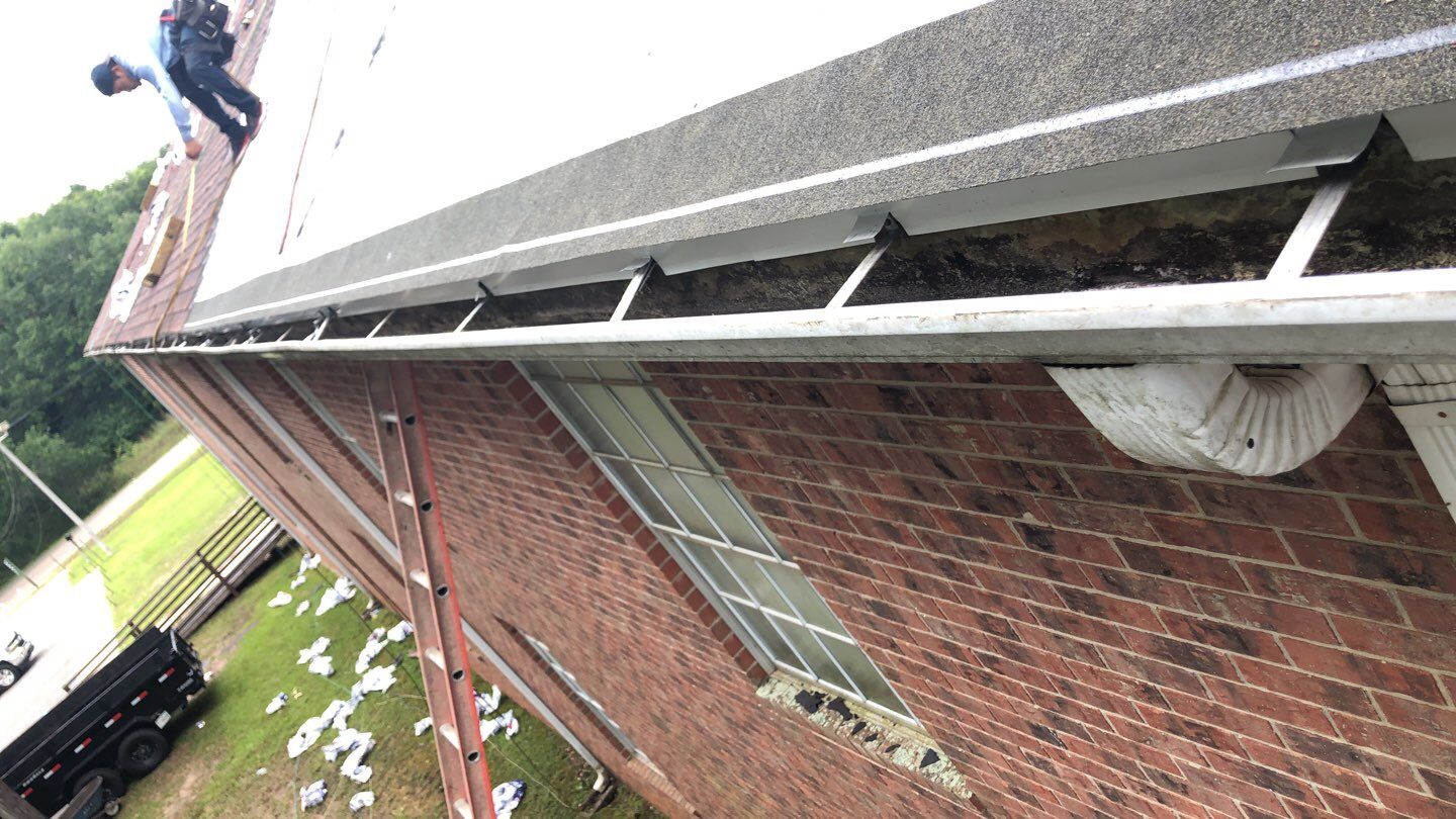 Residential Roofing Installation using Roof Replacement by American Roofing & Construction LLC