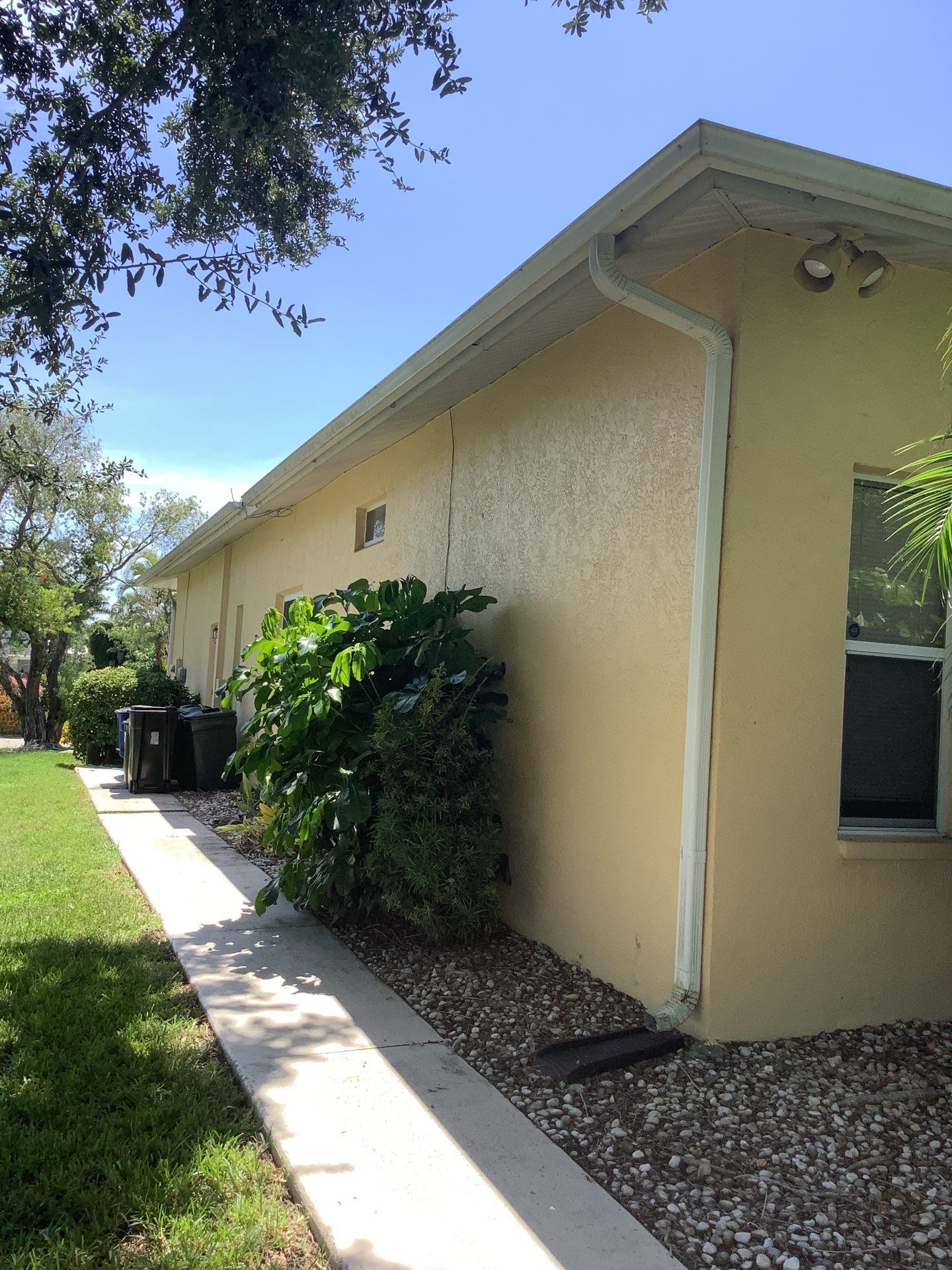 White Seamless Gutters Installation in North Fort Myers FL by Gutter Professors