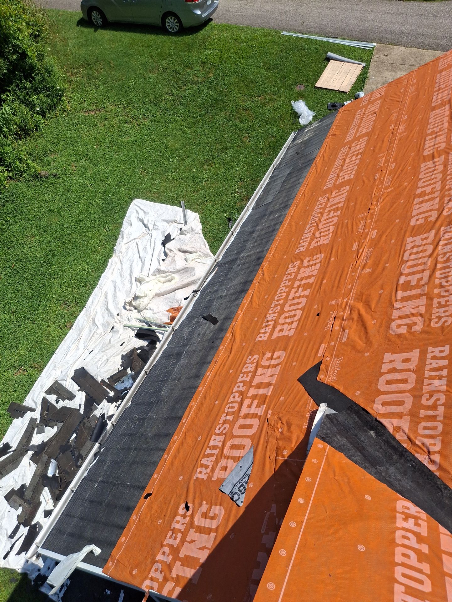 Residential Roofing Installation using GAF Timberline HDZ Charcoal by Rainstoppers Roofing