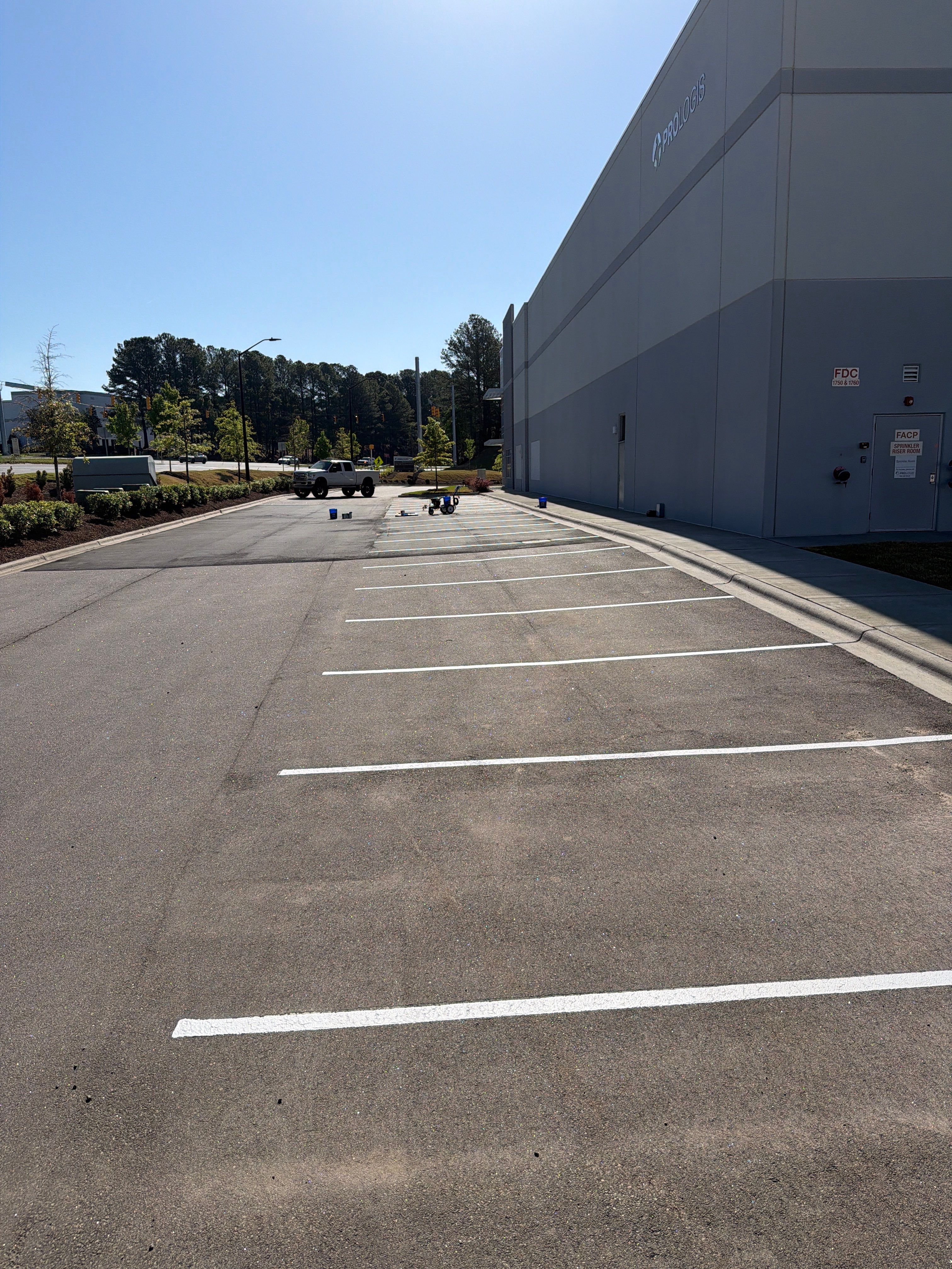 Exterior Commercial Improvements – Parking Lot & Wall Painting by Billy Weatherspoon Contractor