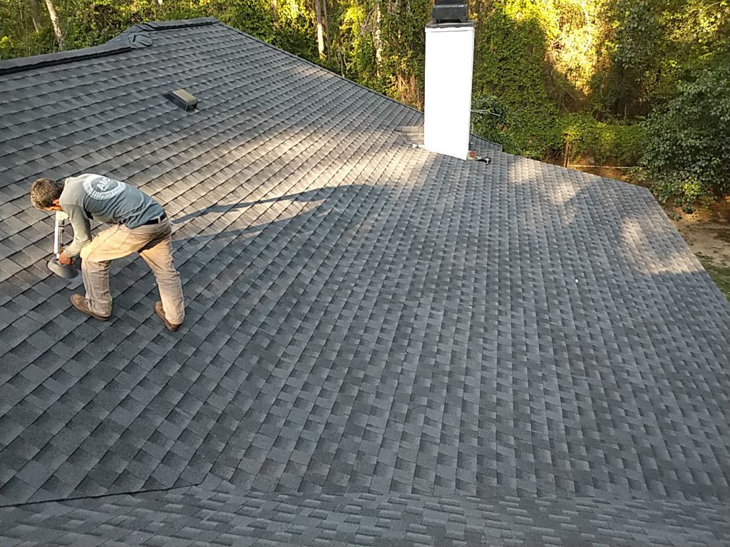 Residential Roofing Installation using Roof Replacement by American Roofing & Construction LLC