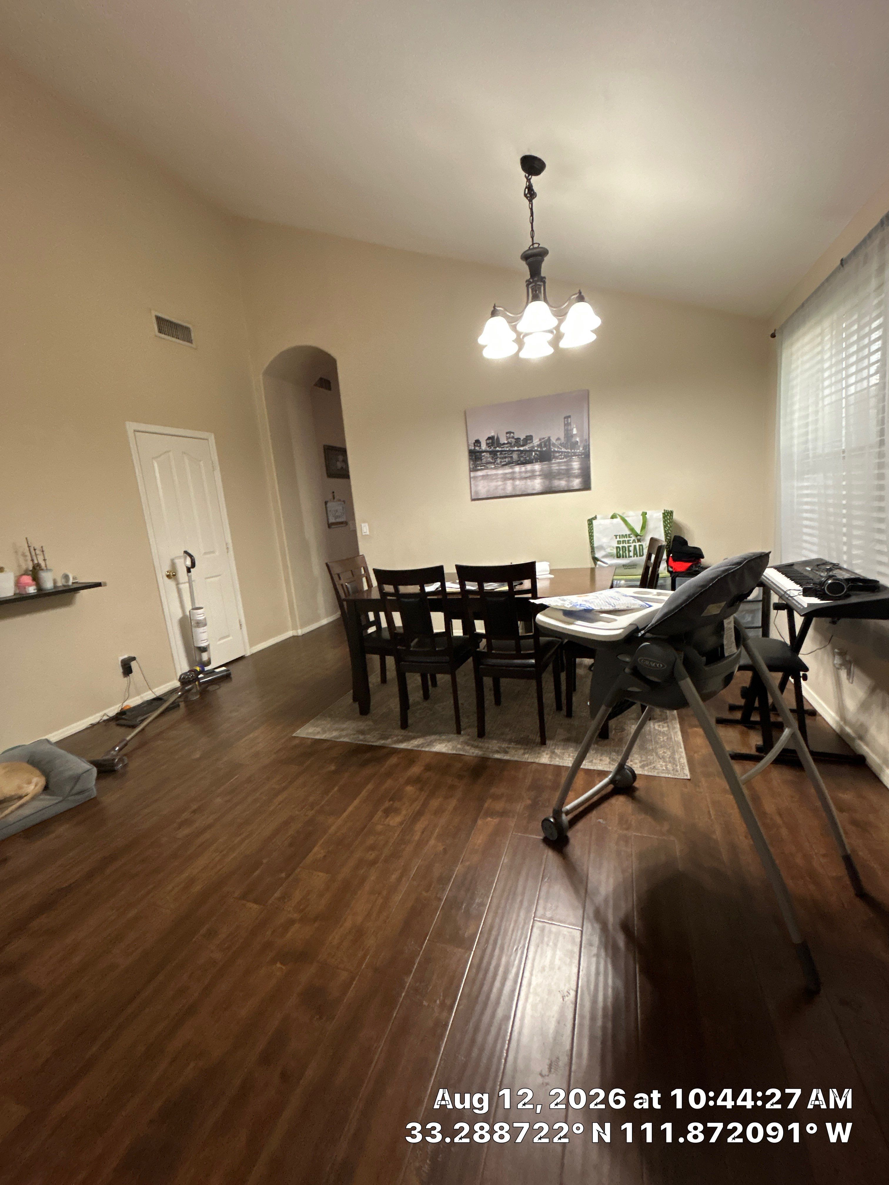 Dark Wood Floor Installation for a Chandler Dining Area by CompanyCam Sales Demo
