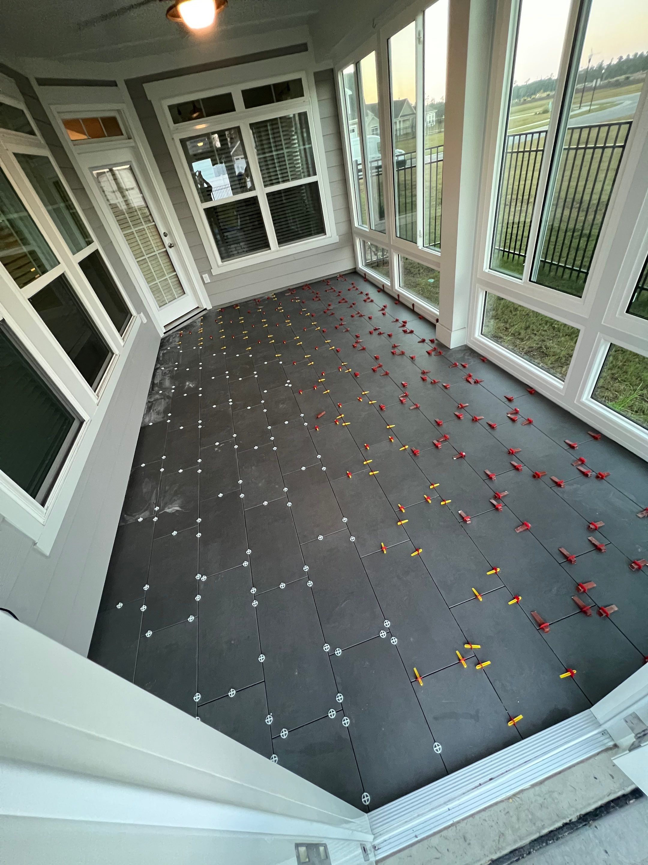 Sunroom Tile 1/3 offset by Footprints Floors of Coastal Carolina