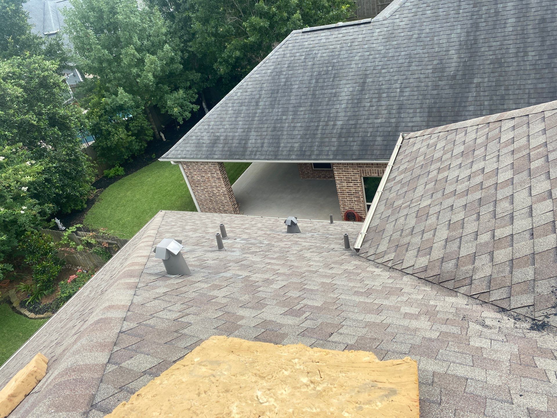 Hail Damage using Owen's Corning Duration (Lifetime) Shingles by Roof Repair Company