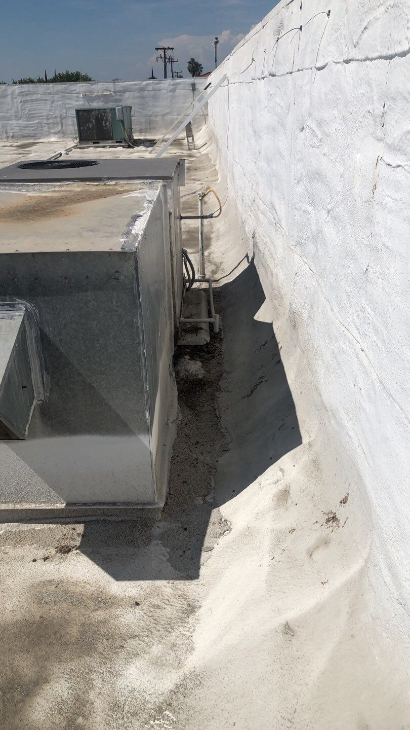 Reburbish existing spray foam job by Straight Edge Roofing Inc