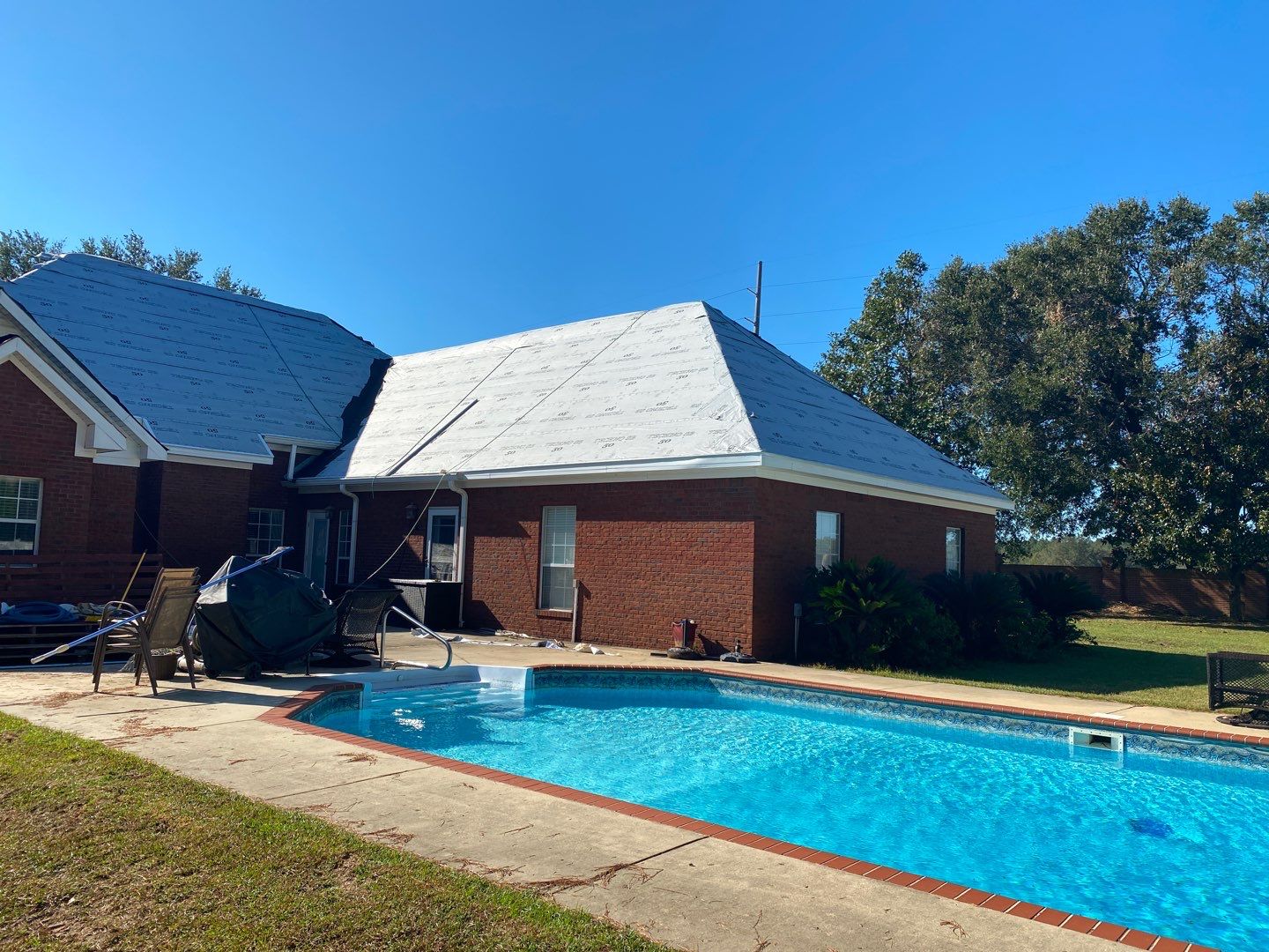 Residential Roofing Installation using Roof Replacement by American Roofing & Construction LLC