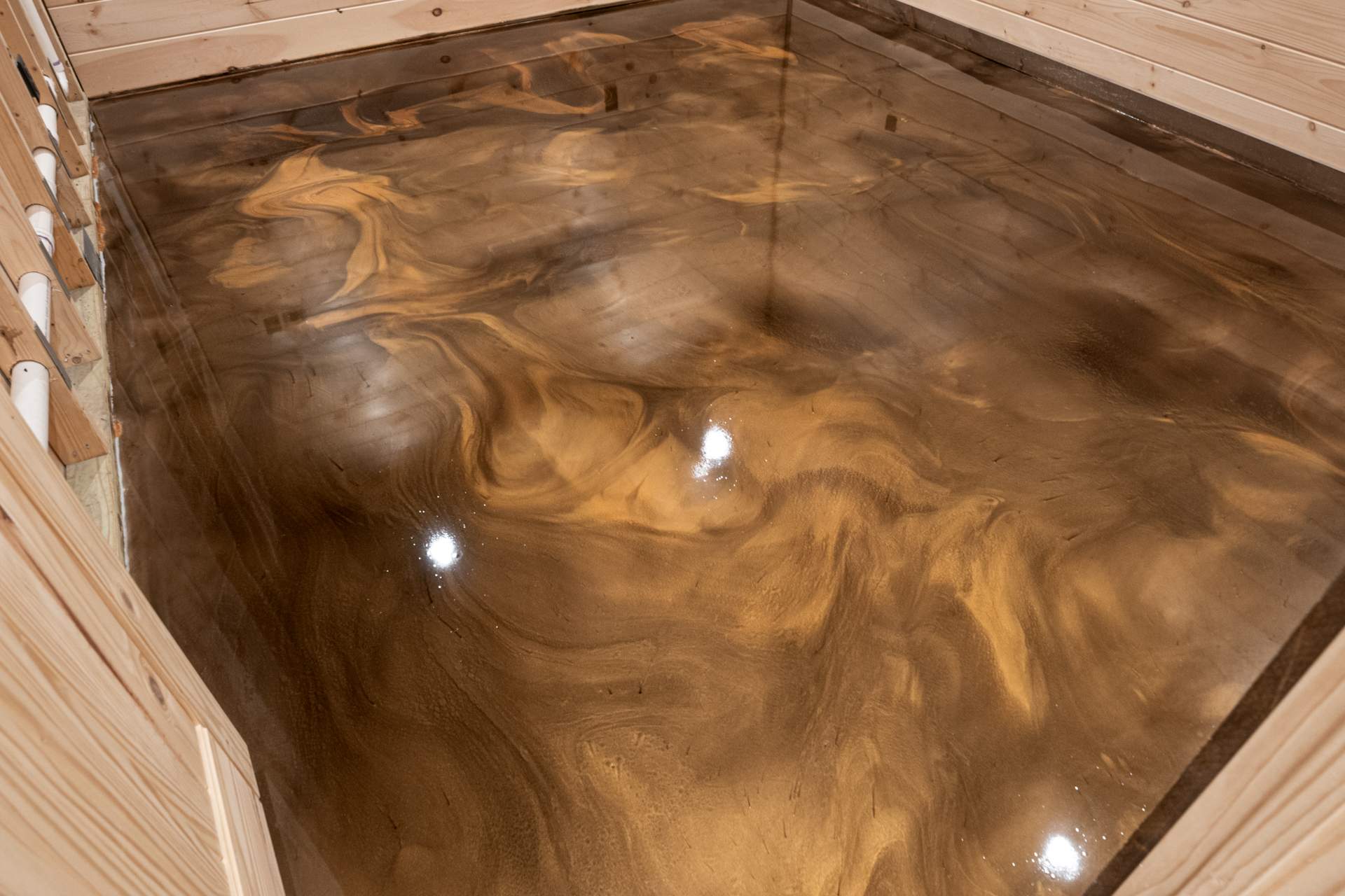 Stunning Metallic Epoxy Basement Installation in Morganton, GA by Elite Floor Solutions