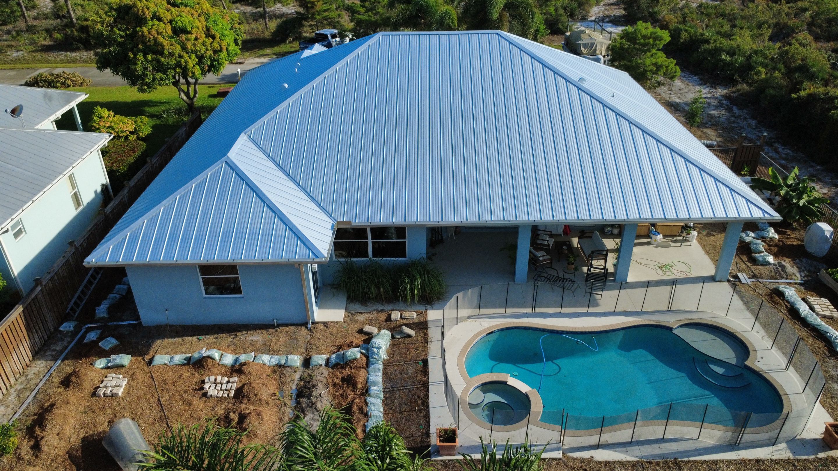 Standing Seam Metal Roof Replacement by Sailfish Roofing