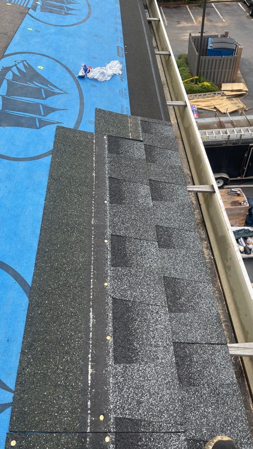 Commercial Roofing Installation using Roof Replacement by American Roofing & Construction LLC