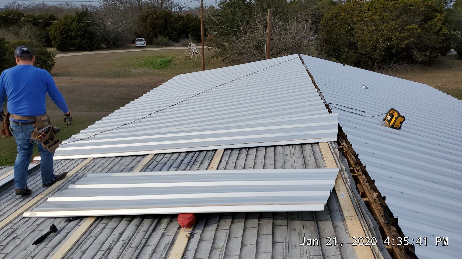 Residential Roofing Installation using PBR Metal Roof by Harvey Roofing & Construction