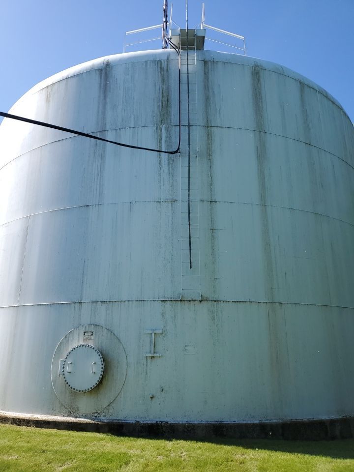 Water tank cleaning by Northern Power Washing LLC.