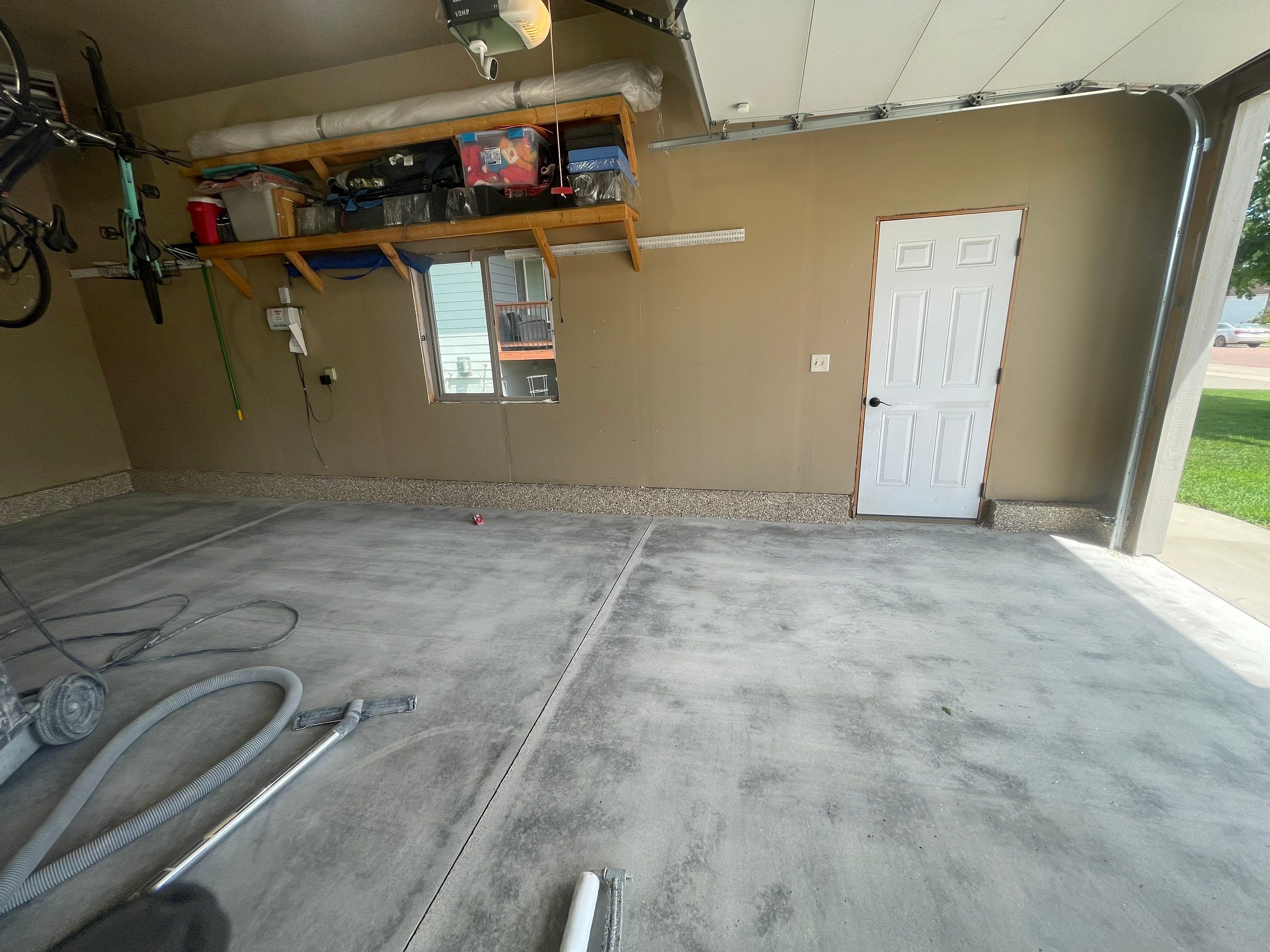 Garage Floor Coating in Tea, South Dakota by Select Painting, Coatings & Garage Cabinets