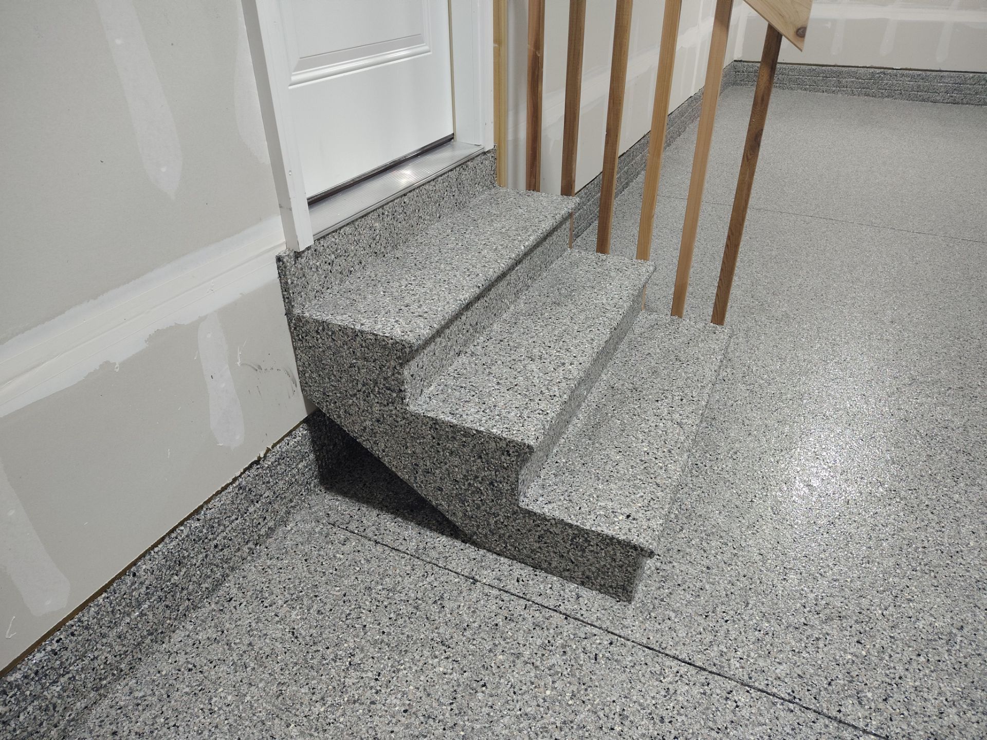 Adel, IA Garage: Complete Keystone Wrap on Floors, Stairs, and Stem Walls by Revival Concrete Coatings