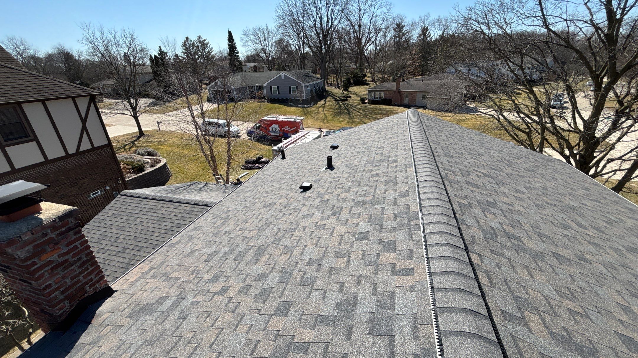 Siding Replacement using Alside Charcoal Smoke and Roof Replacement using Owens Corning Peppercorn by 180 Contractors