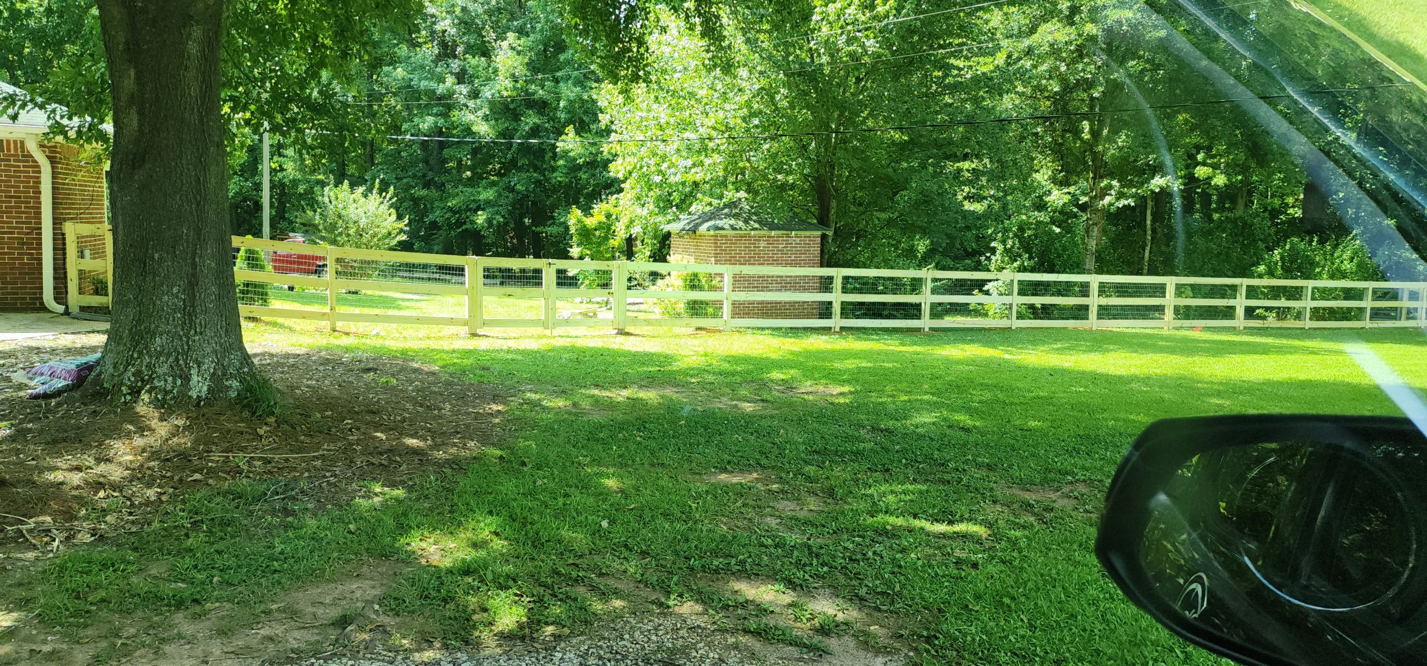 Fence Installation of 3 Rail Ranch with Wire Backing by Titans of Timber Fence & Stain