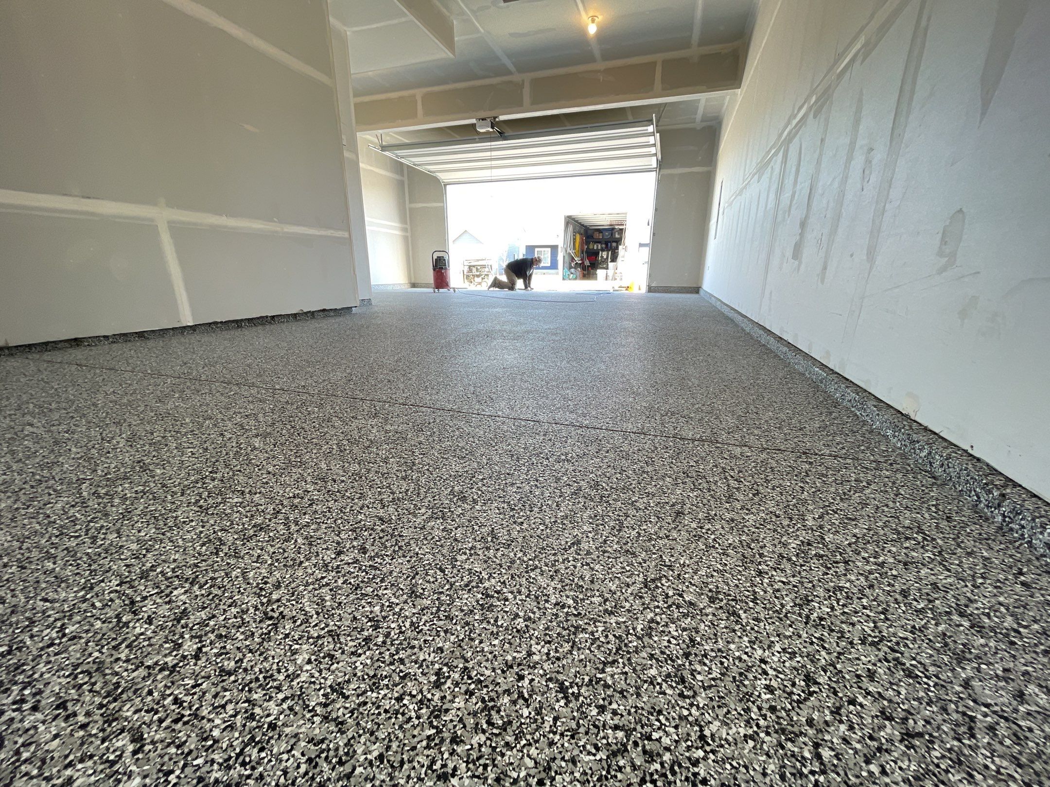 Garage Transformation using Domino by Croc Coatings, LLC