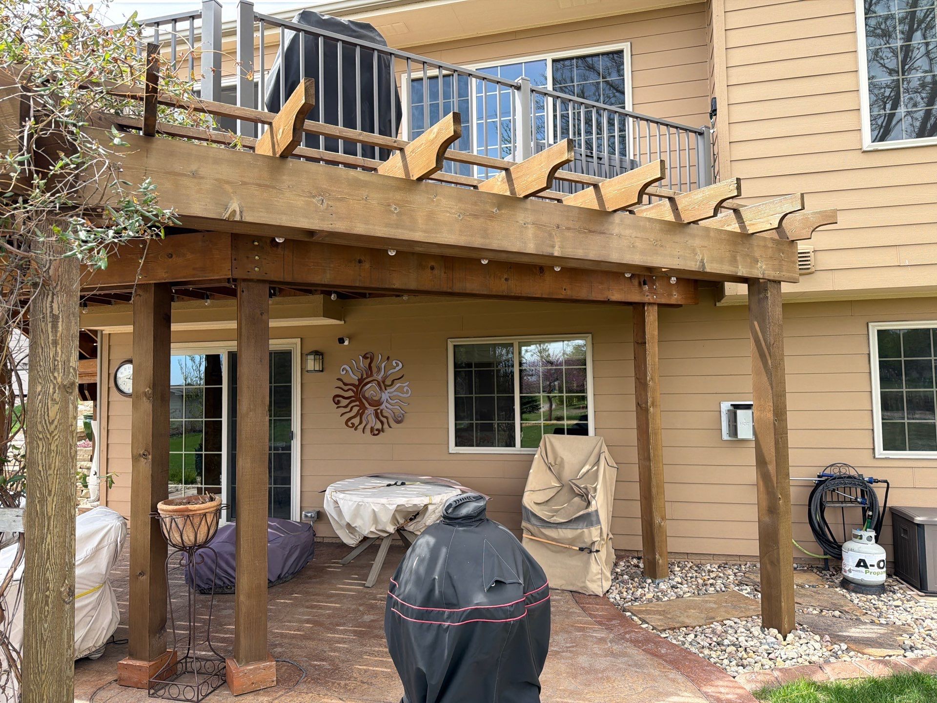 Tiered Wood Deck and Pergola Refinishing in Sioux Falls by Select Painting, Coatings & Garage Cabinets