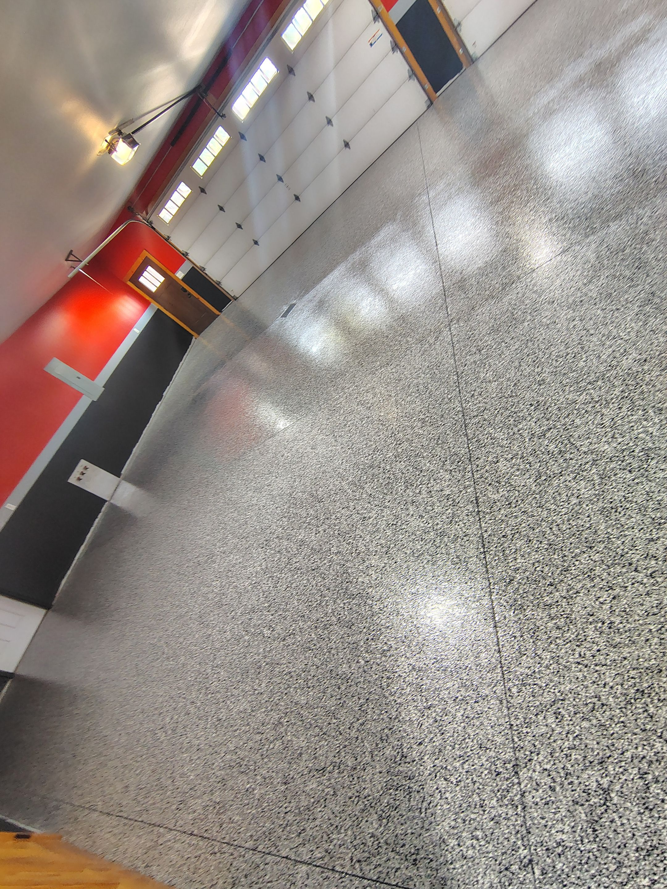 Multi-Car Garage Concrete Coating and Floor Refinishing in Hull by Select Painting, Coatings & Garage Cabinets