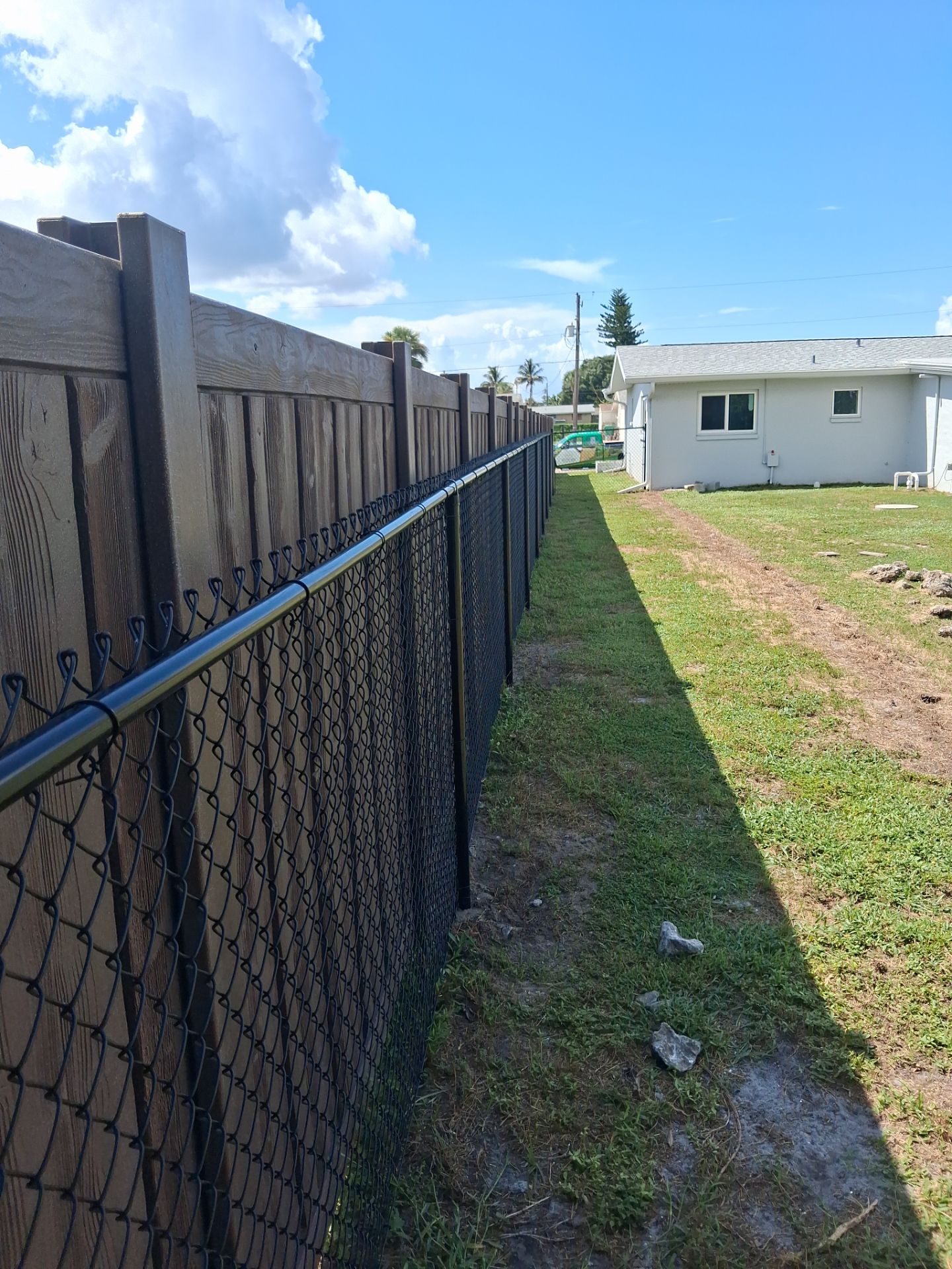 Black Chain Link Fence Installation for Residential Backyard in Port Charlotte by True Fence LLC