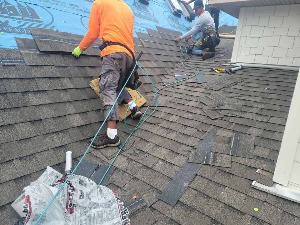 Residential Roofing Installation using Roof Replacement by American Roofing & Construction LLC
