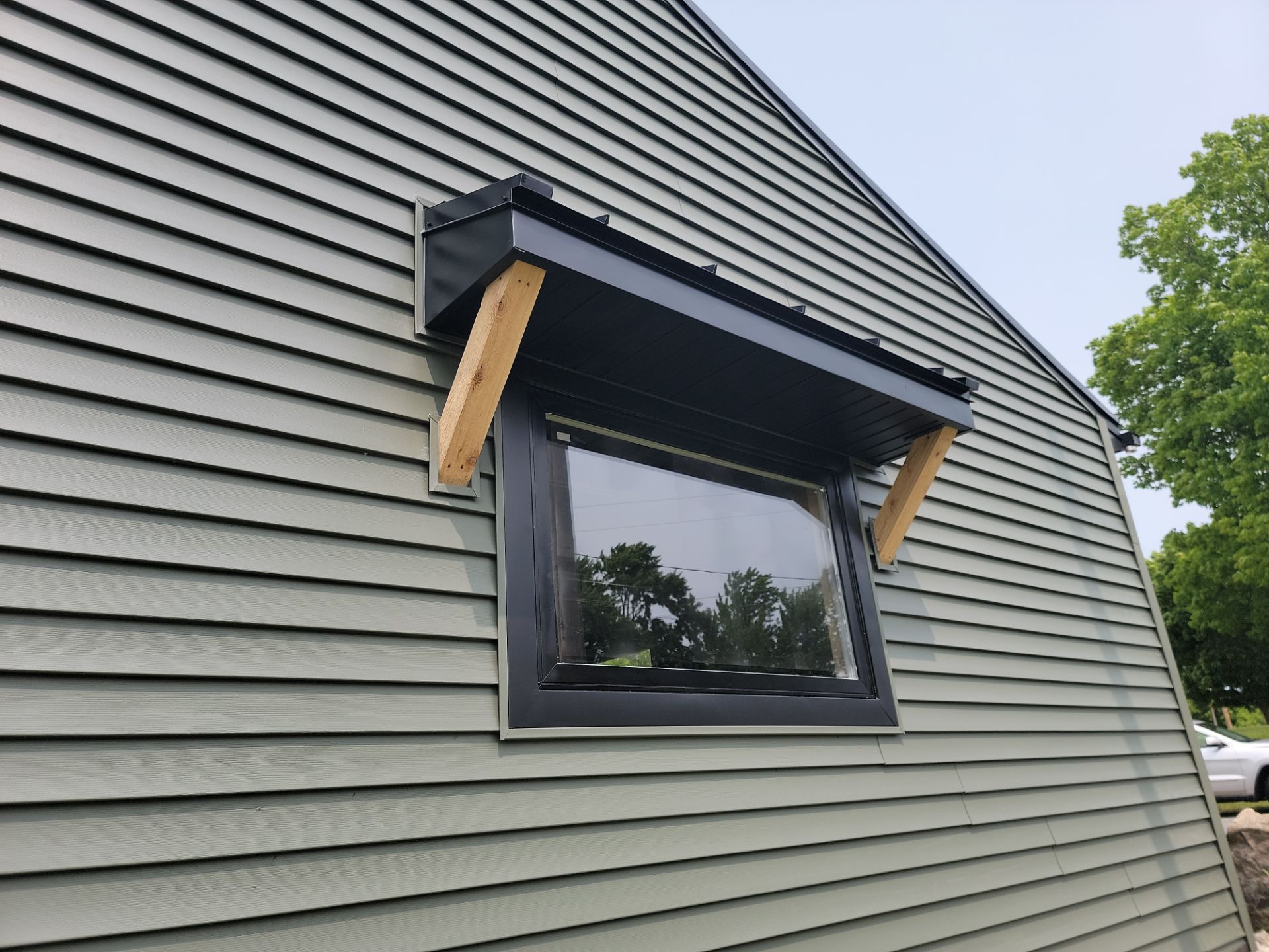 ROOF, SIDING AND SOFFIT INSTALLATION by Avalon Roofing and Exteriors