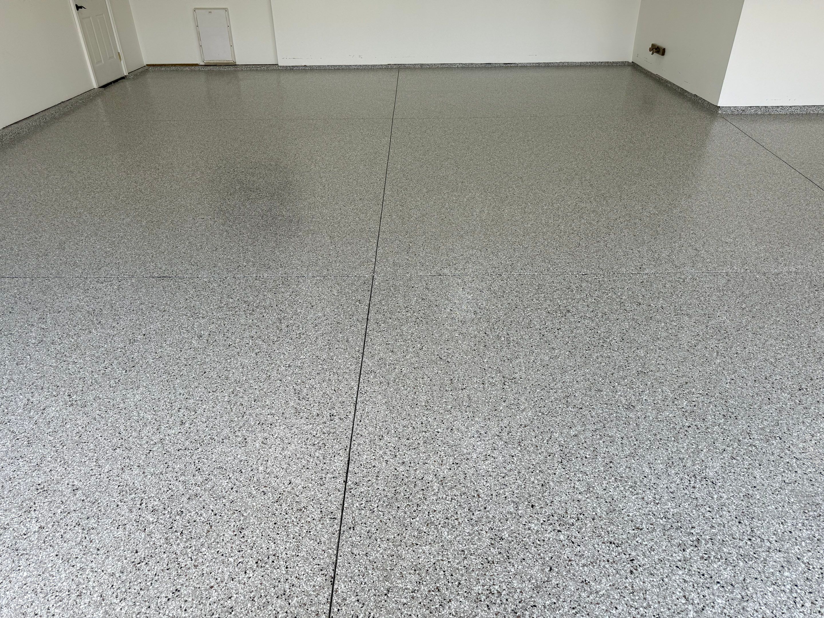 Full Garage Floor Resurfacing and Decorative Epoxy Flake Finish by Select Painting, Coatings & Garage Cabinets