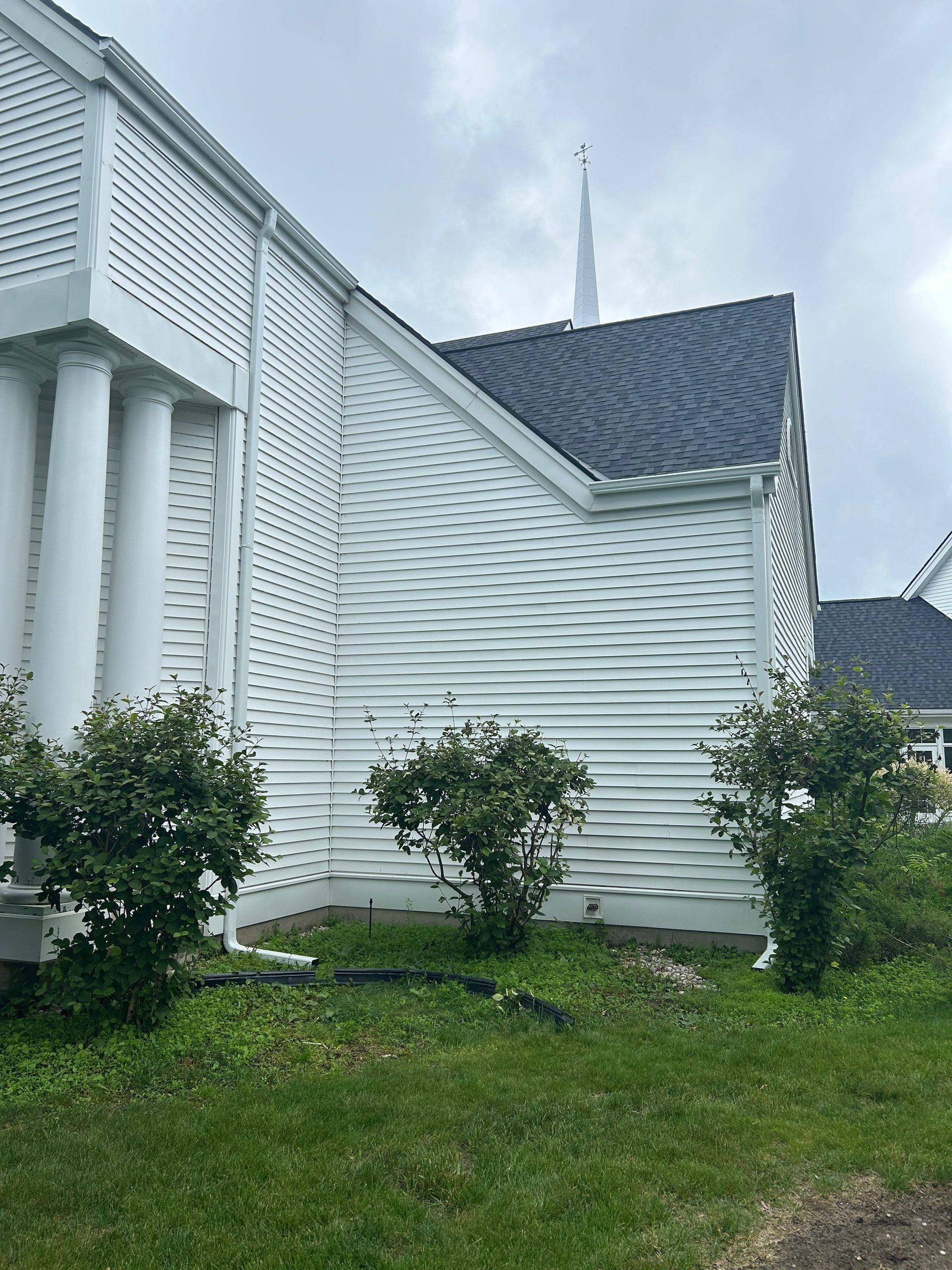 Gutter and Gutter Screen Installation for Harbor Springs Church by Rainbow Seamless Systems