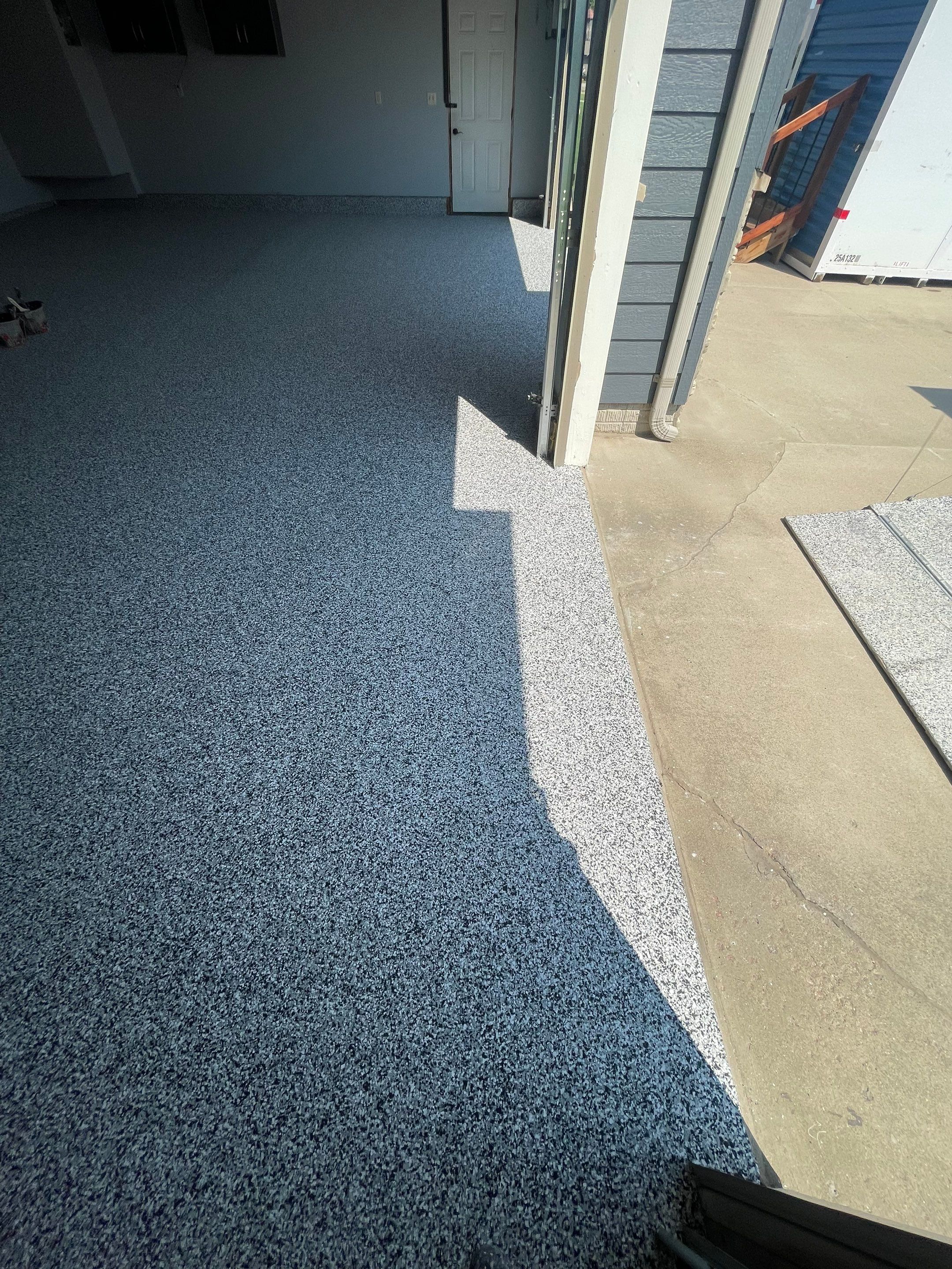 Sioux Falls Garage Concrete Coating Installation with Domino Flake by Select Painting, Coatings & Garage Cabinets