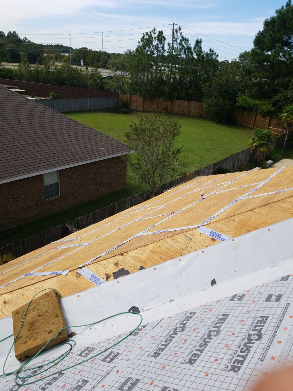Residential Roofing Installation using Roof Replacement by American Roofing & Construction LLC