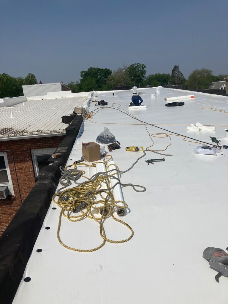 Recover of a downtown building  by Grell Roofing, LLC