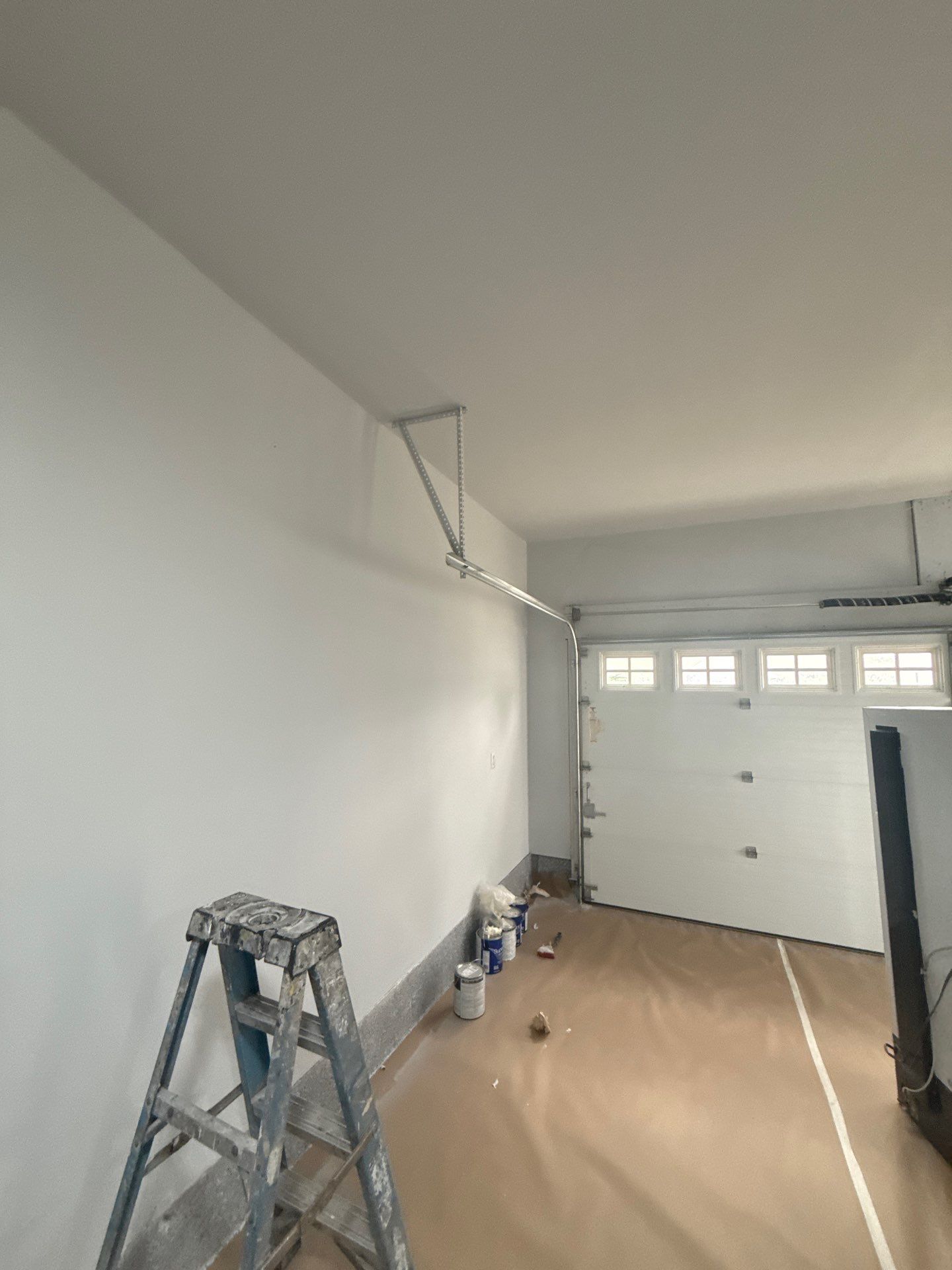 Garage Repaint Including Doors by Midwest Paint LLC
