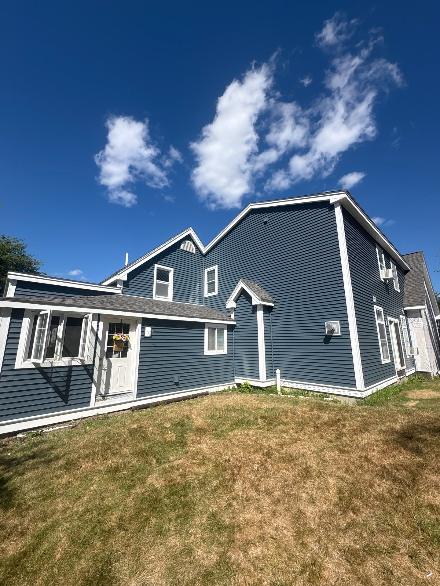 Premium Mixed-Material Siding Installation in North Billerica, MA by Mighty Dog Roofing of Greater Middlesex County