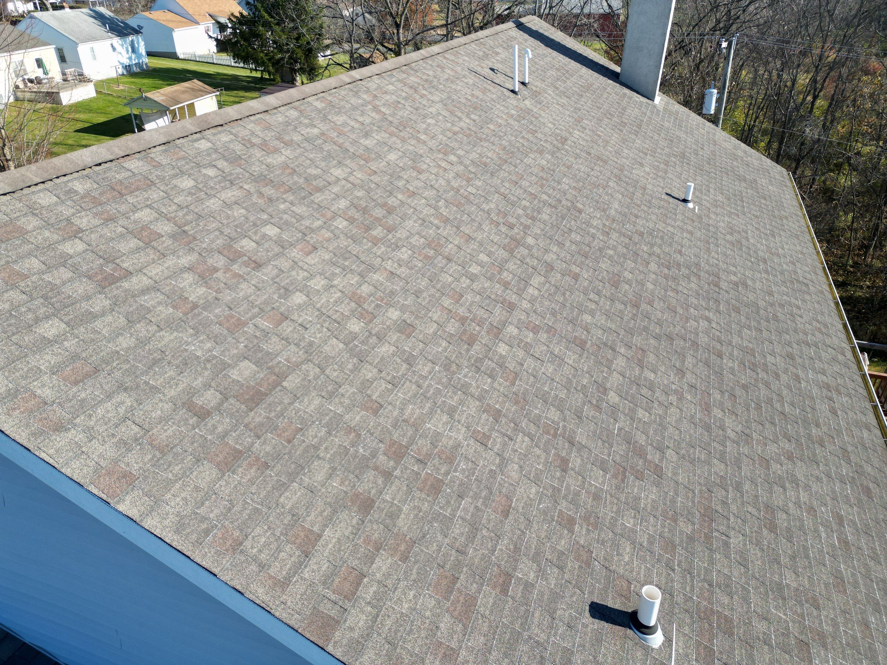 Residential Roofing Installation using Performance Panel Metal - Frost Black by RoofX 