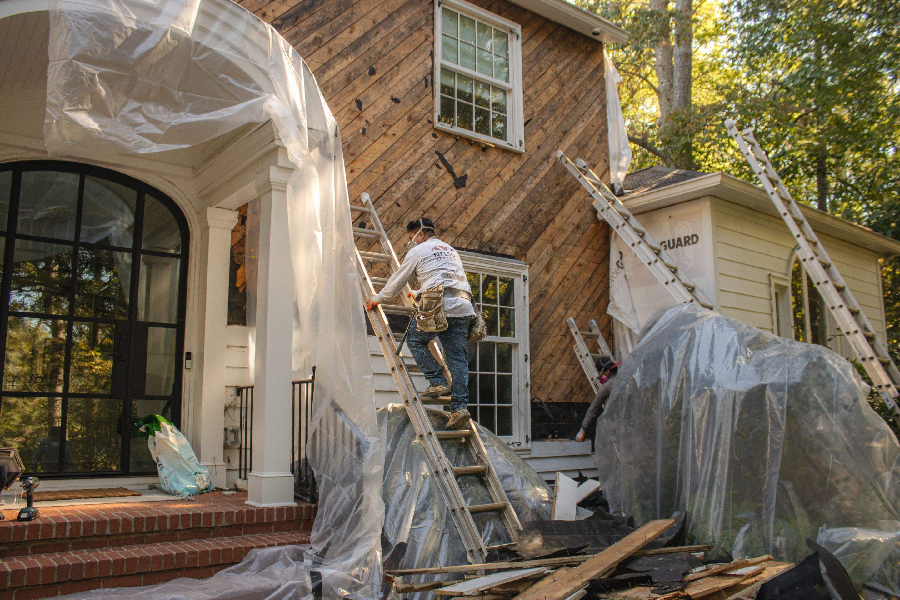 Siding Installation using James Hardie Color Plus Lap Siding by Nelson Exteriors 