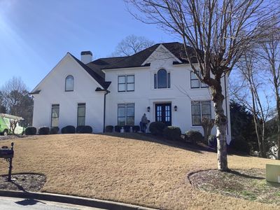 White Brick Exterior Painting and Deck Refinishing in Duluth