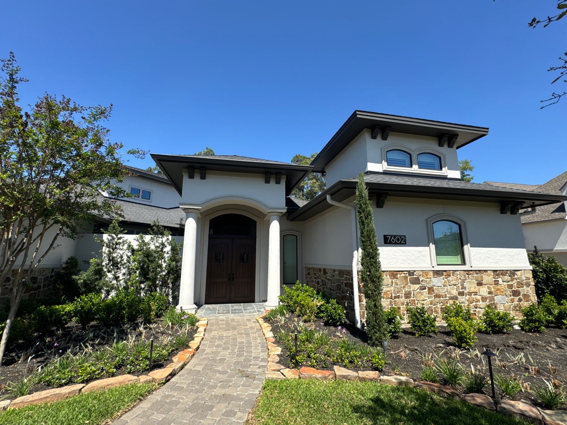 Complete Exterior Painting and Stucco Refinishing in Spring by Rolling Nations