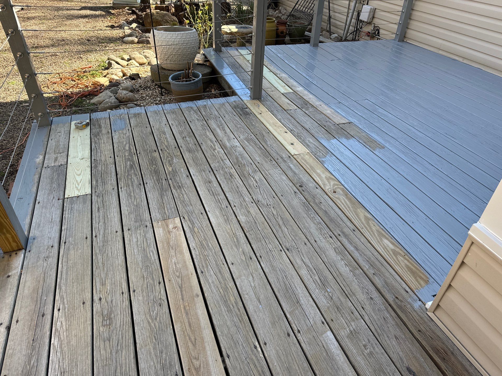 Deck staining by GonzalezPainters & Contractors Inc 