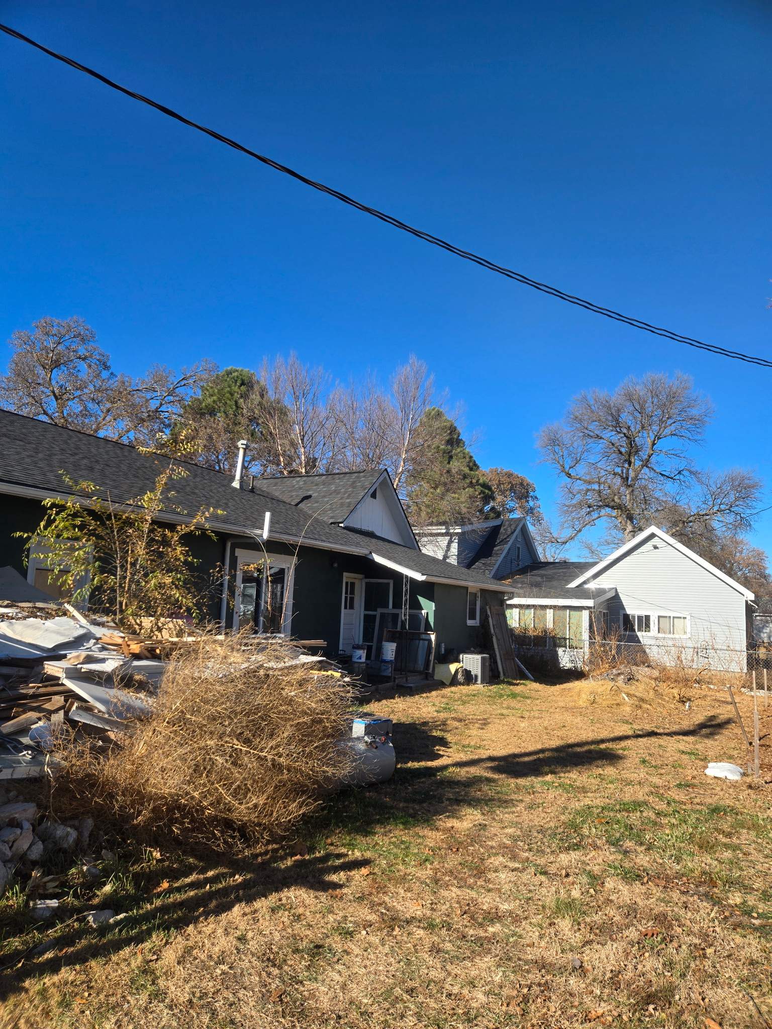 Asphalt Shingle Roof Replacement and Sheathing Repair in Wood River by Star Home