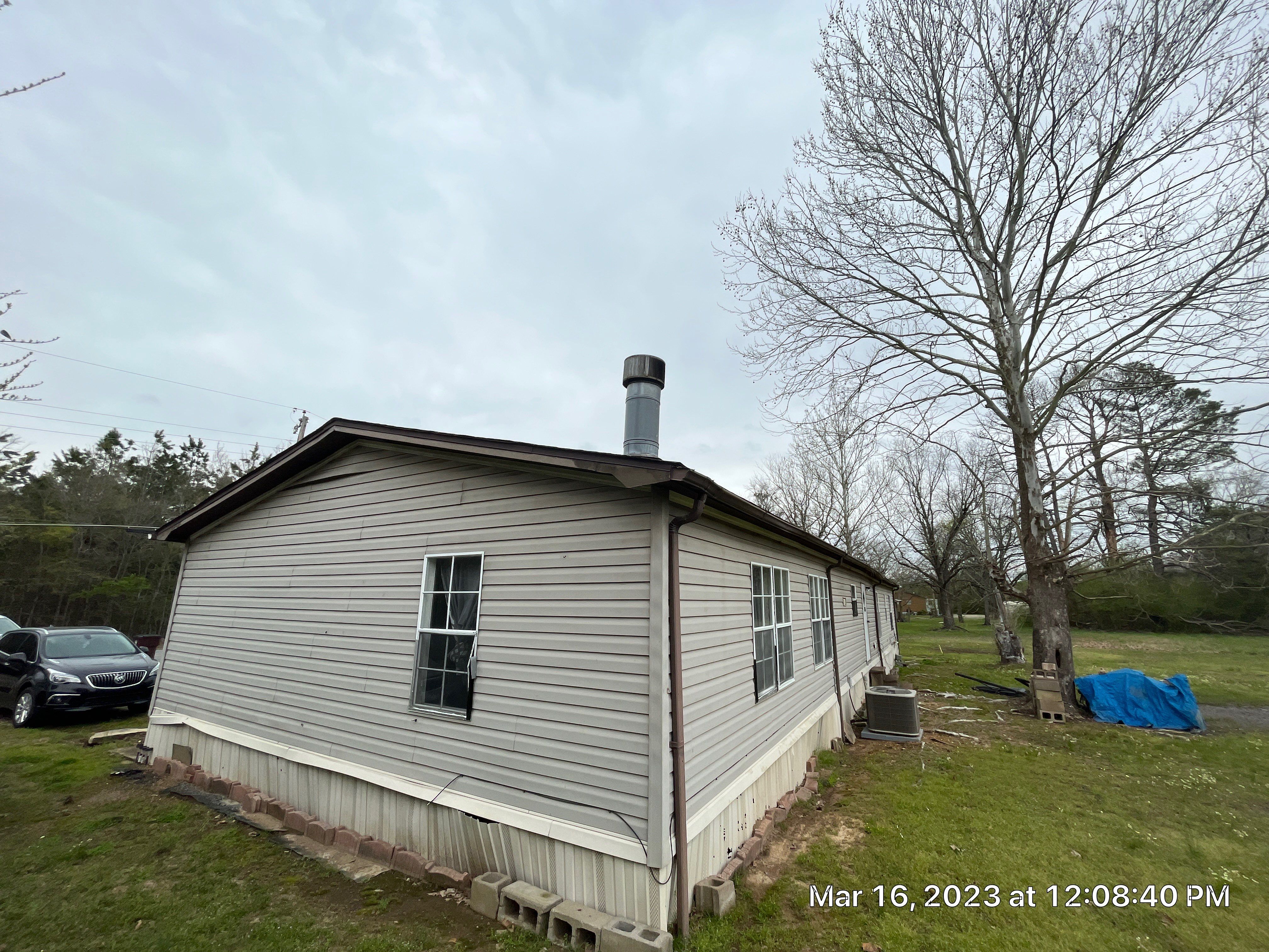 Storm Restoration Reroof: 25 Year 3-Tab Shingle by Hostetler Roofing