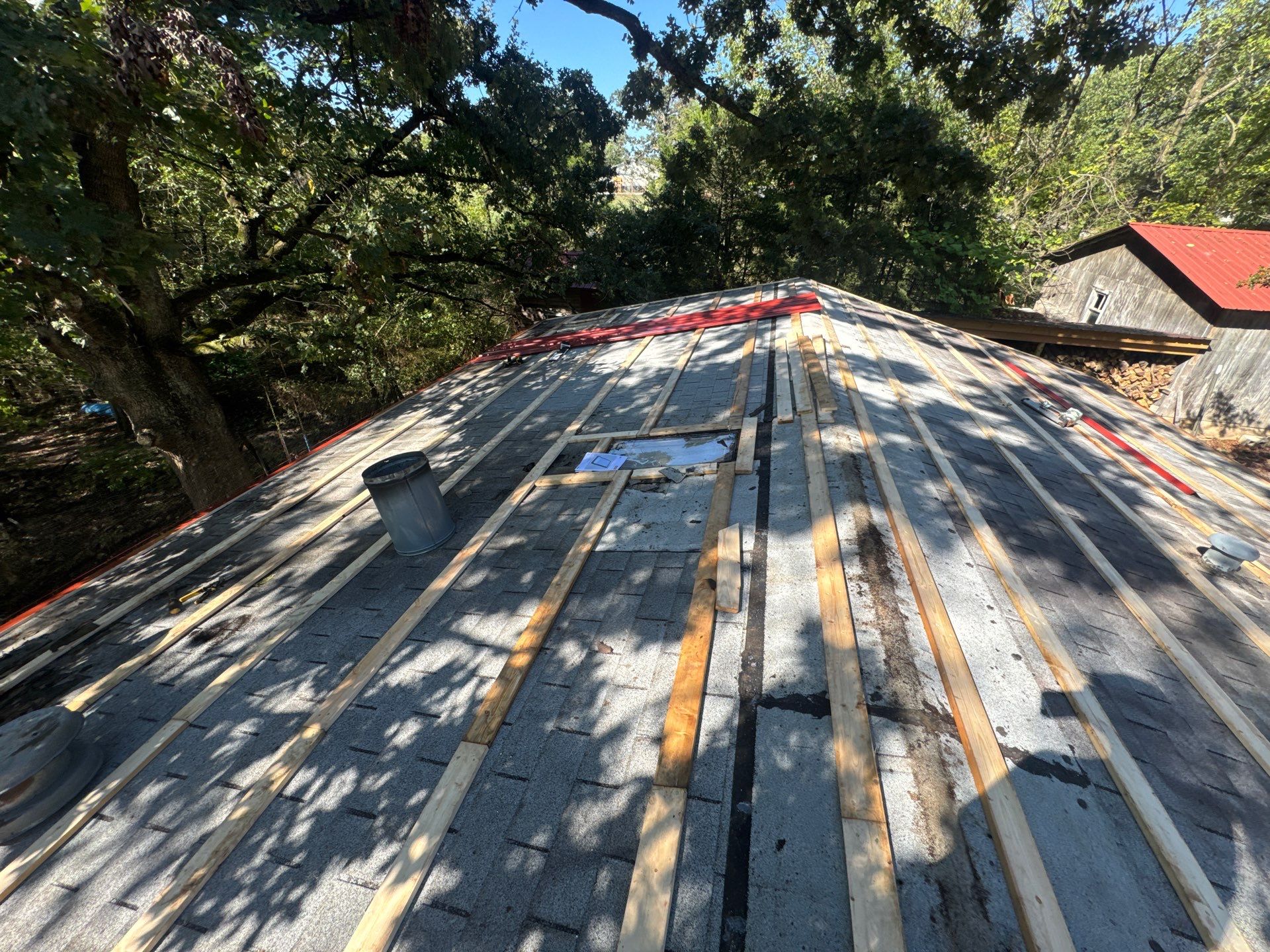 Residential Roofing Install - 26 Gauge G-Rib Metal - Color Red by Titan Commercial & Residential Roofing 