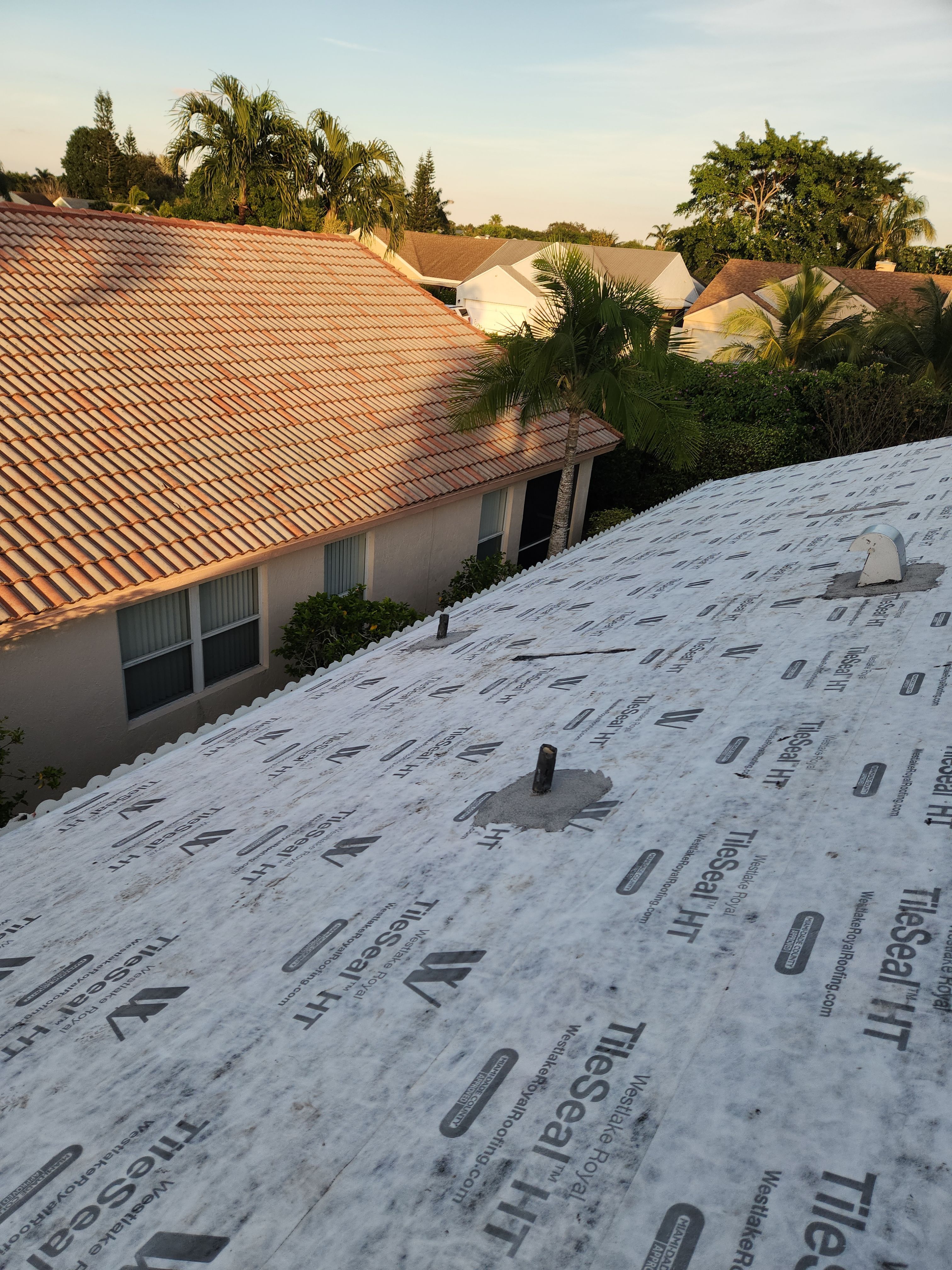 Concrete Tile Roof Replacement and Wood Decking Repair in Boca Raton by Aastro Roofing