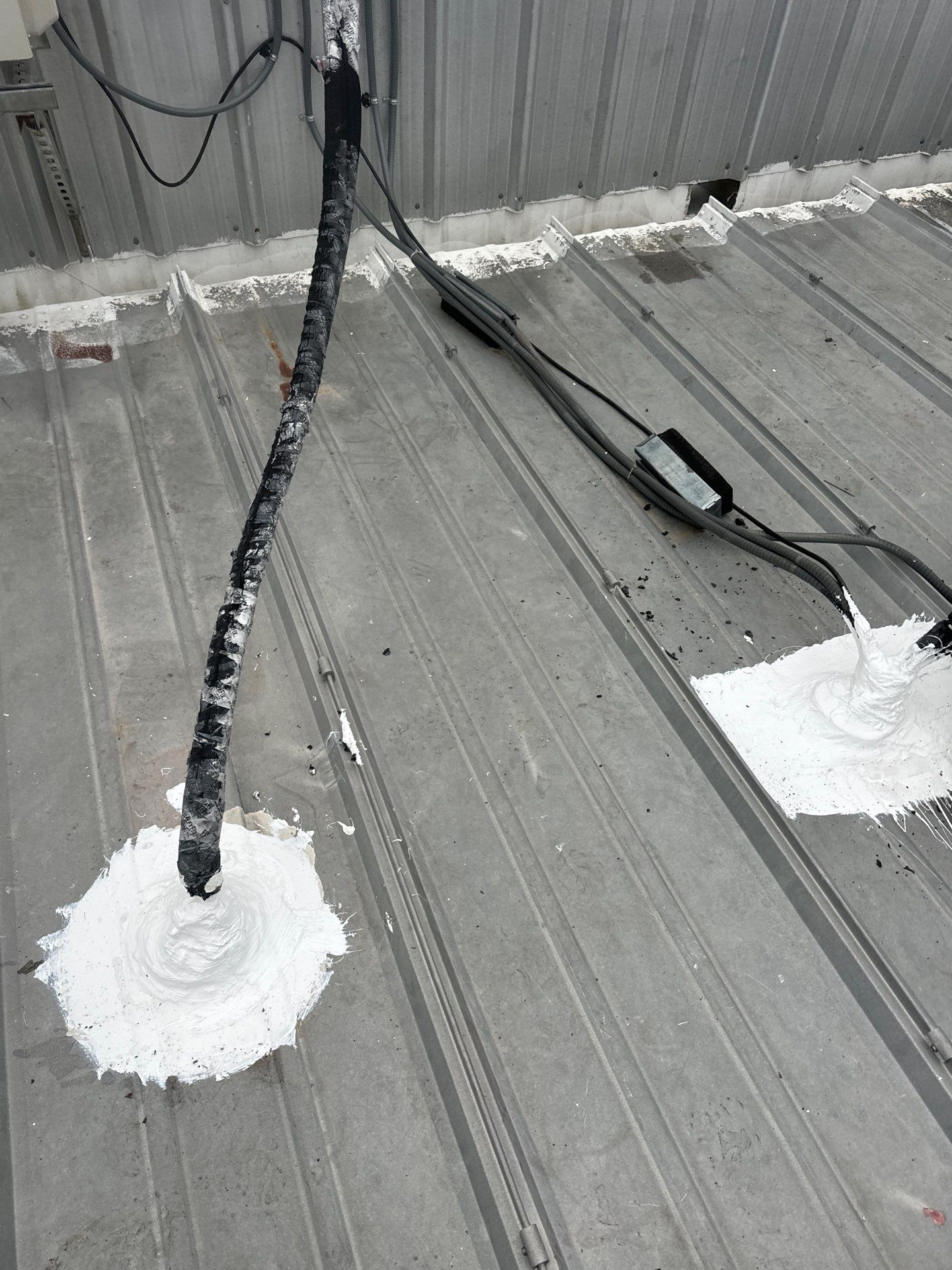 Metal Roof Leak Repair by Associates Roofing Unlimited