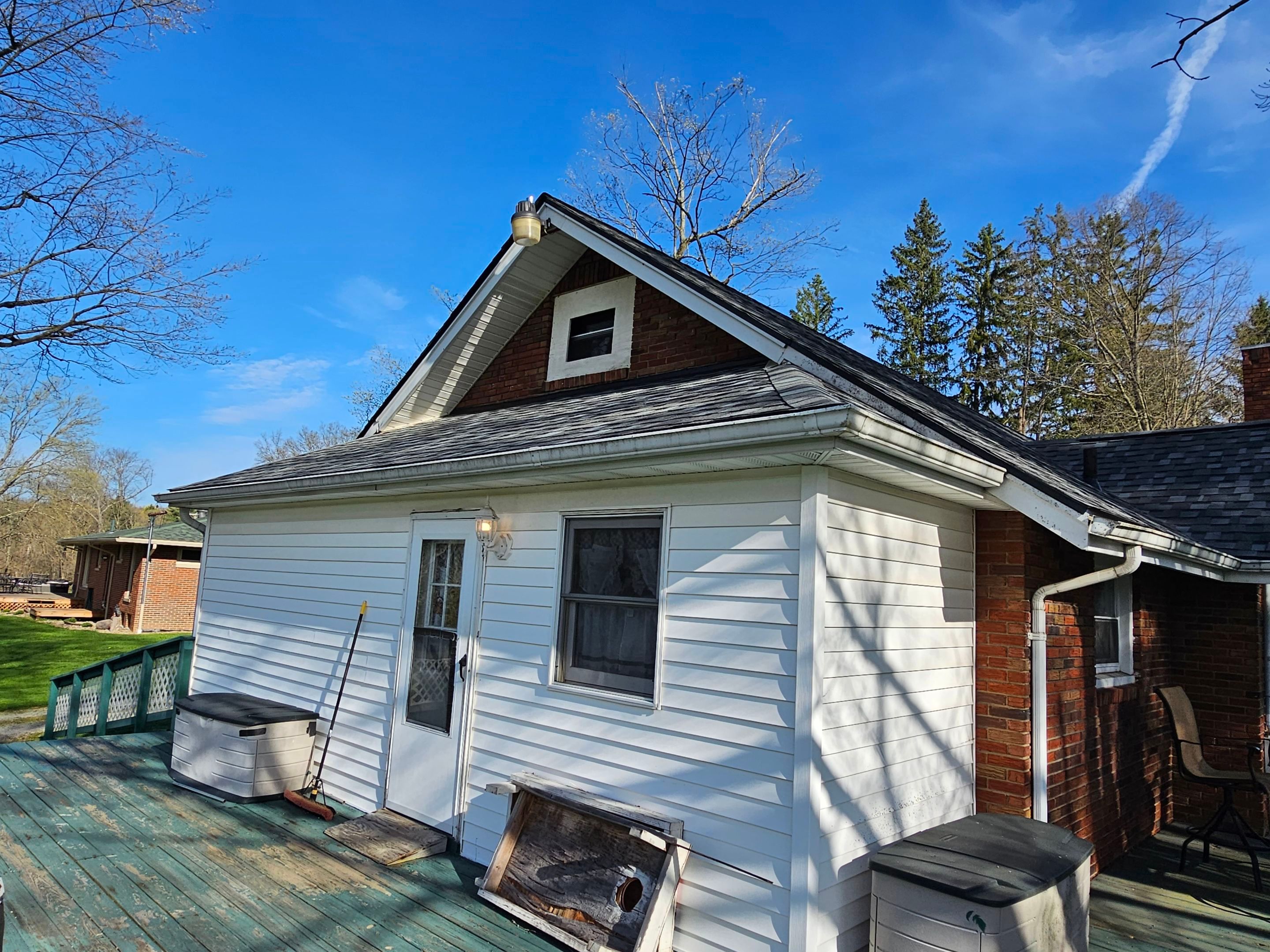 ATLAS PINNACLE COLOR: COASTAL GRANITE DRIP EDGE: BLACK by Eagle Eye Roofing