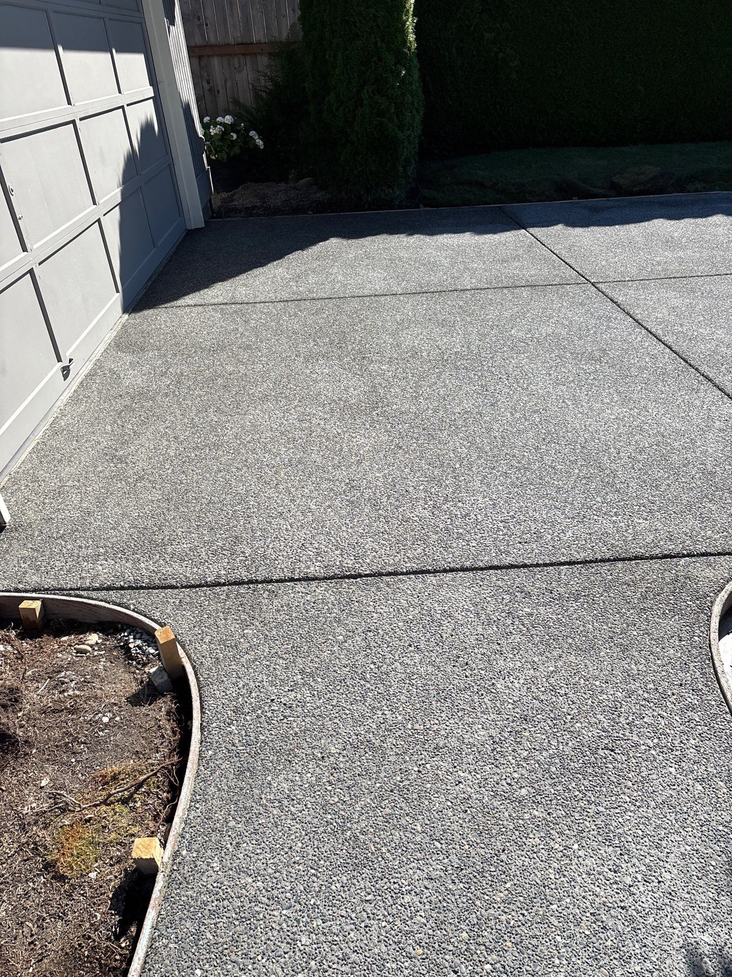 Exposed Aggregate Concrete Driveway Makeover  by Jireh Asphalt & Concrete Inc 