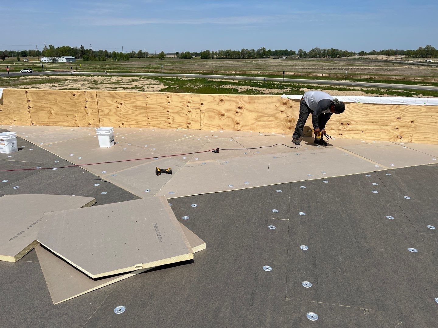 Commercial Roofing Installation using 60 mil rubber roof  by Nitro Roofing and Construction